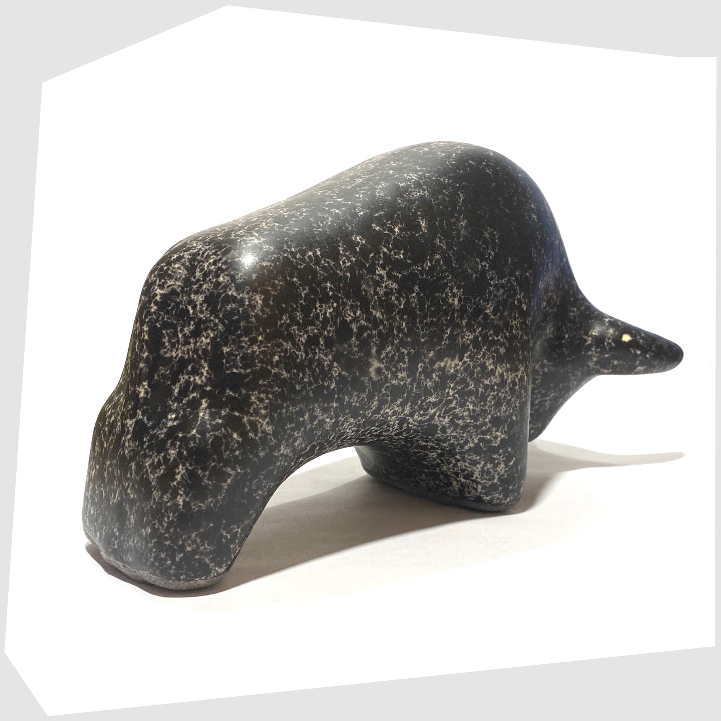 rear of the otto keramik bull in black speckled glaze with cream flecks