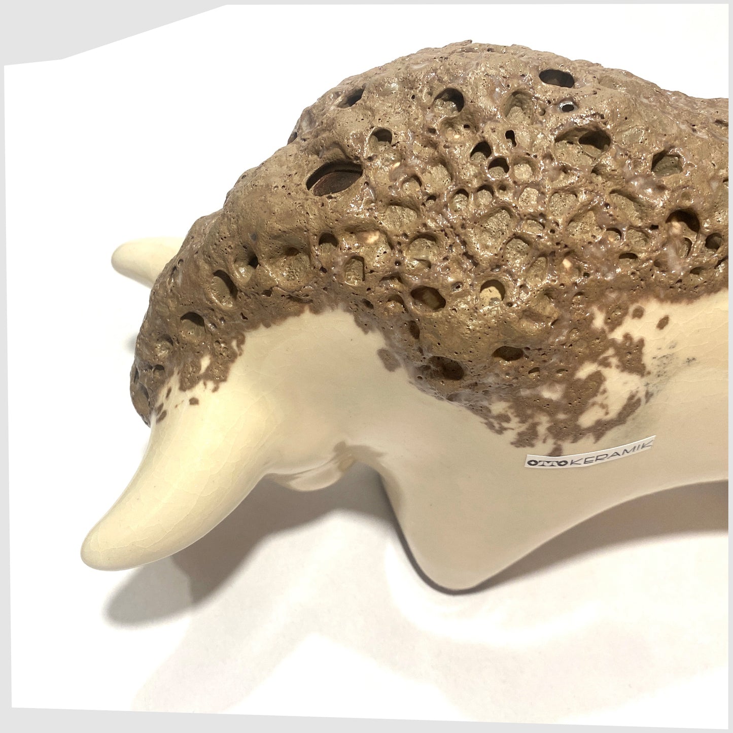 brown fat lava on the otto keramik bull in off-white glaze