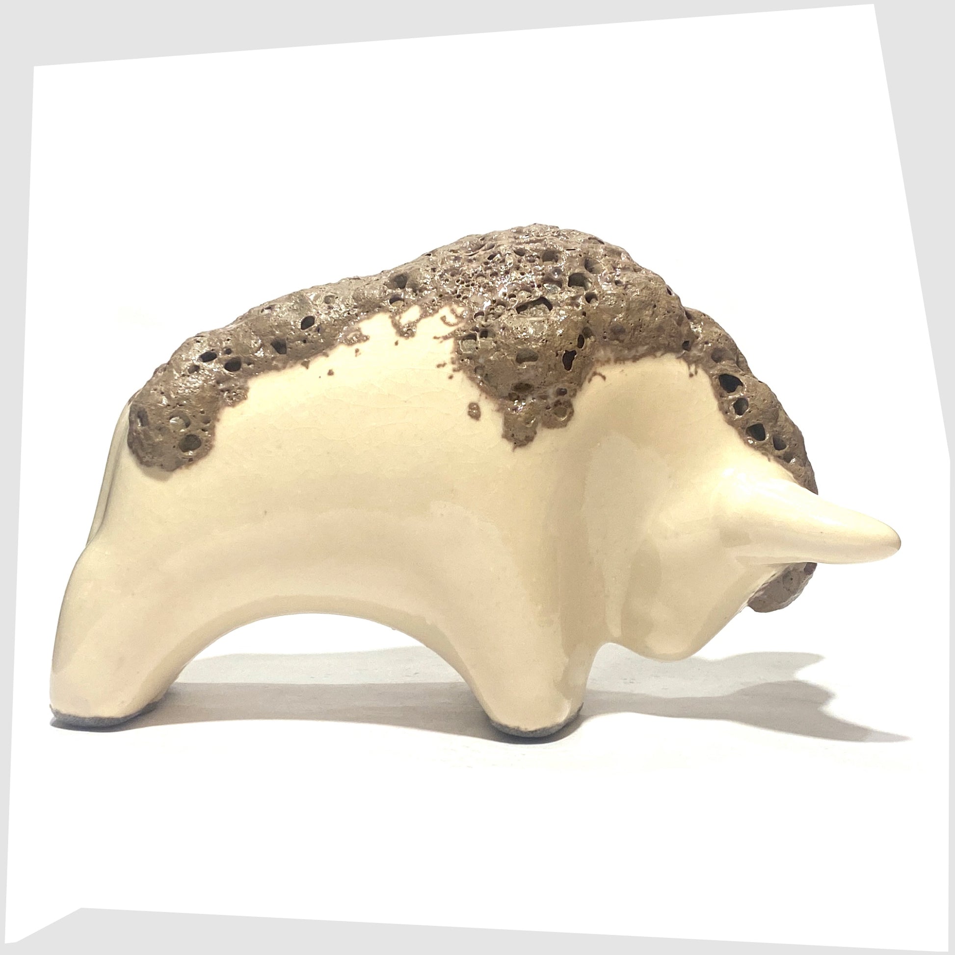otto keramik ceramic bull in off-white glaze with brown fat lava along the spine