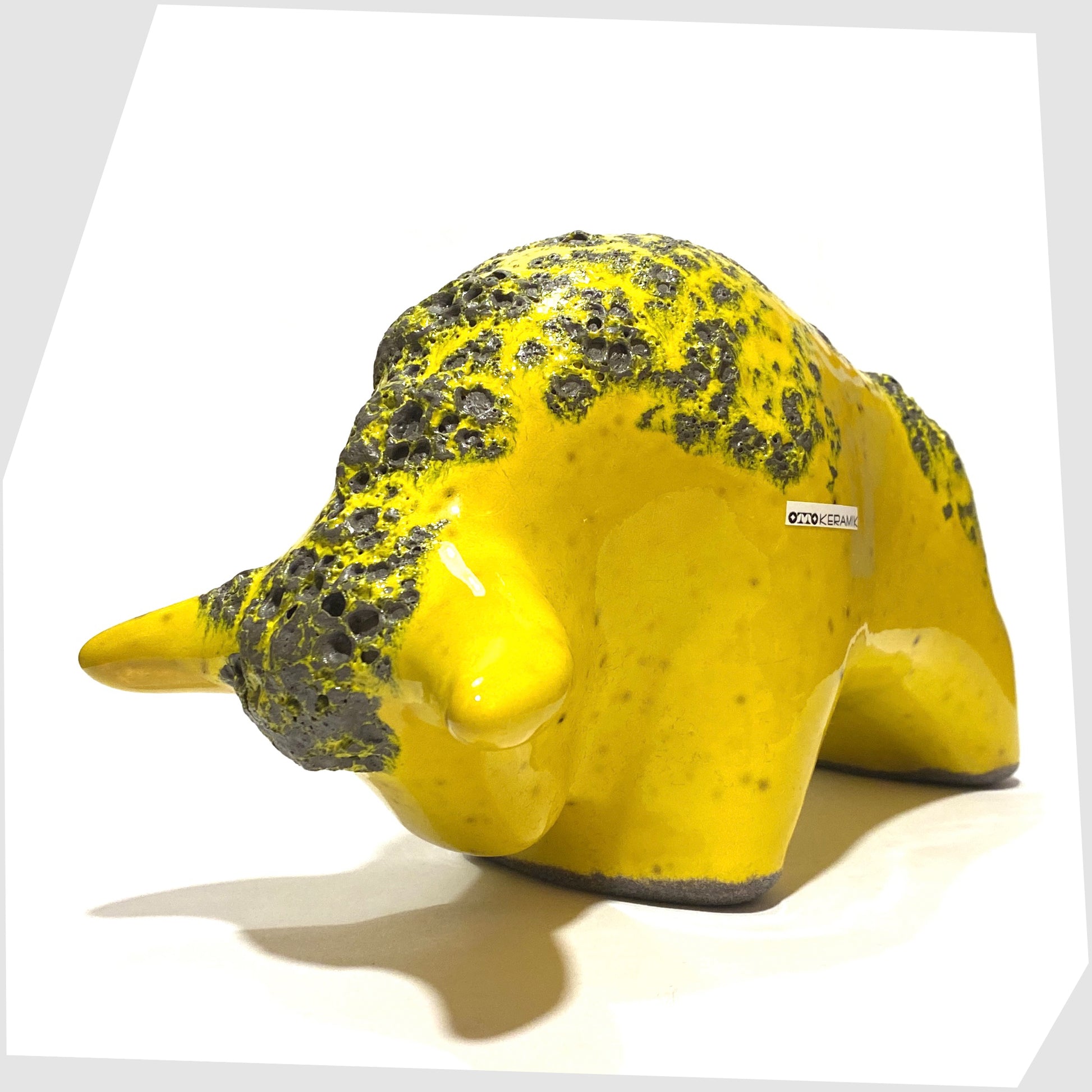 otto keramik ceramic bull in gloss yellow glazing with grey fat lava along the spine