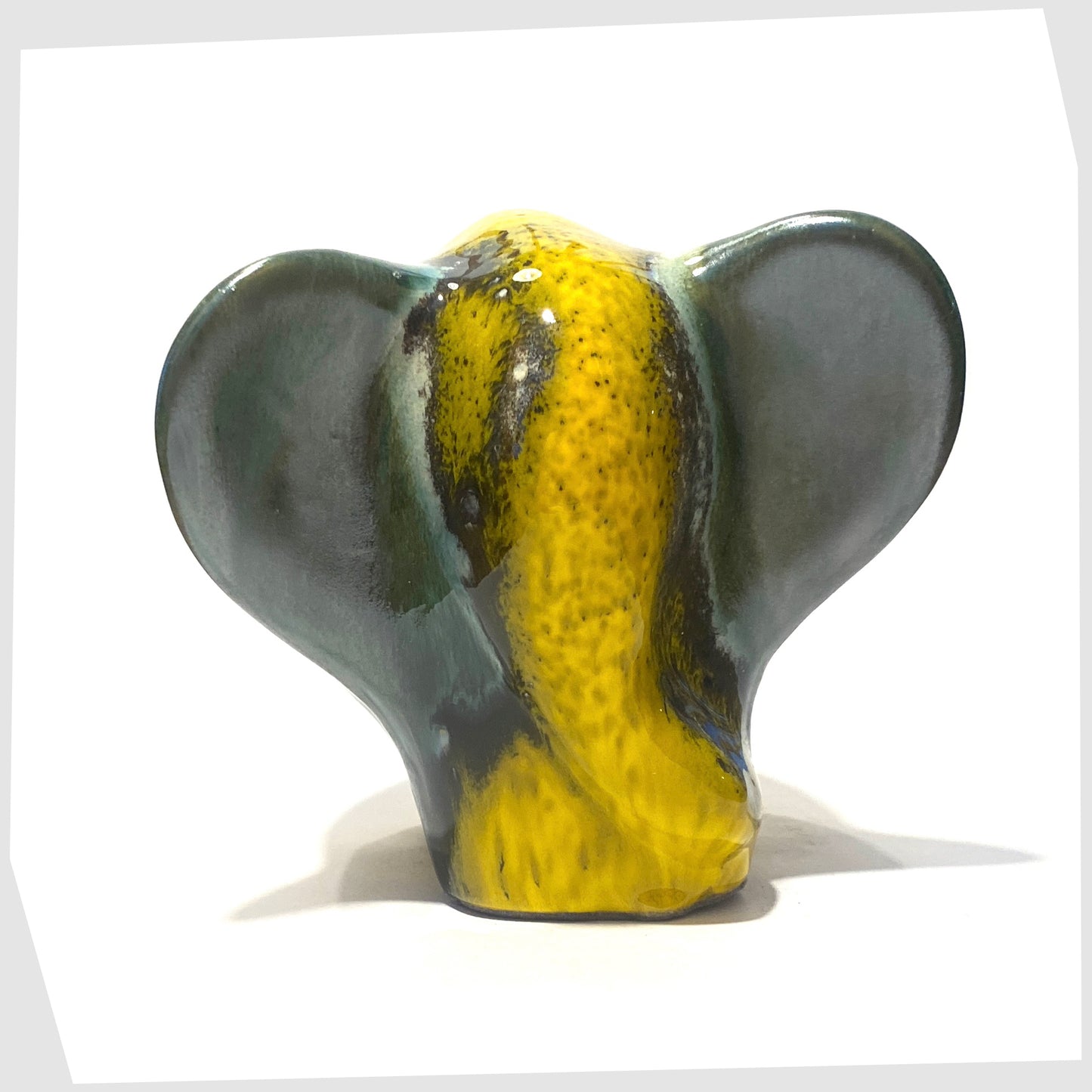 otto keramik ceramic elephant sculpture in vibrant yellow and rich sea green Brazil glaze