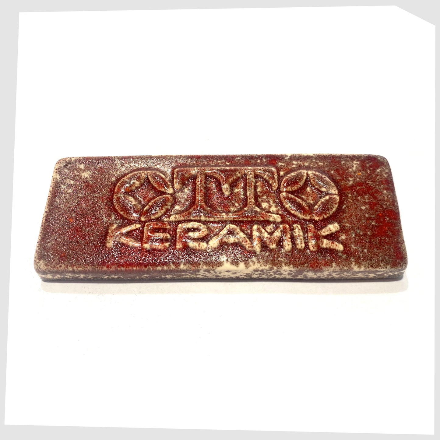 Otto Keramik ceramic display brick in Molten Red speckled glaze of red and cream speckles