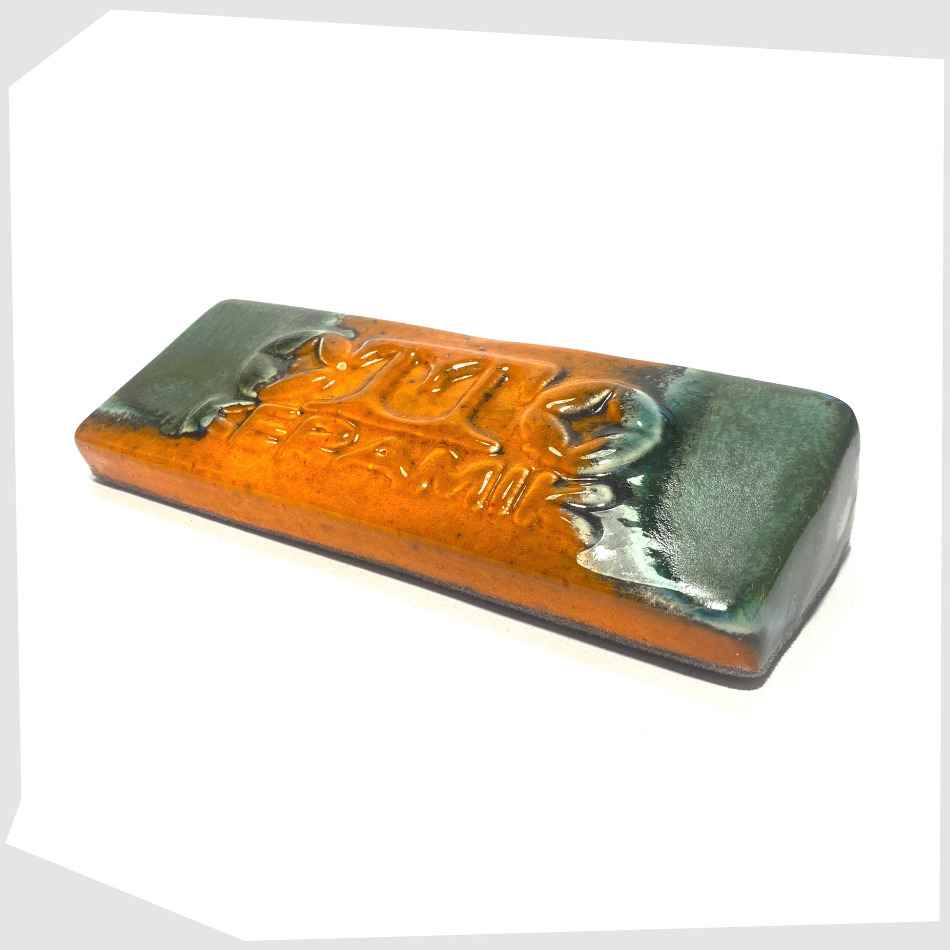 otto keramik display brick in orange and sea green peru glaze