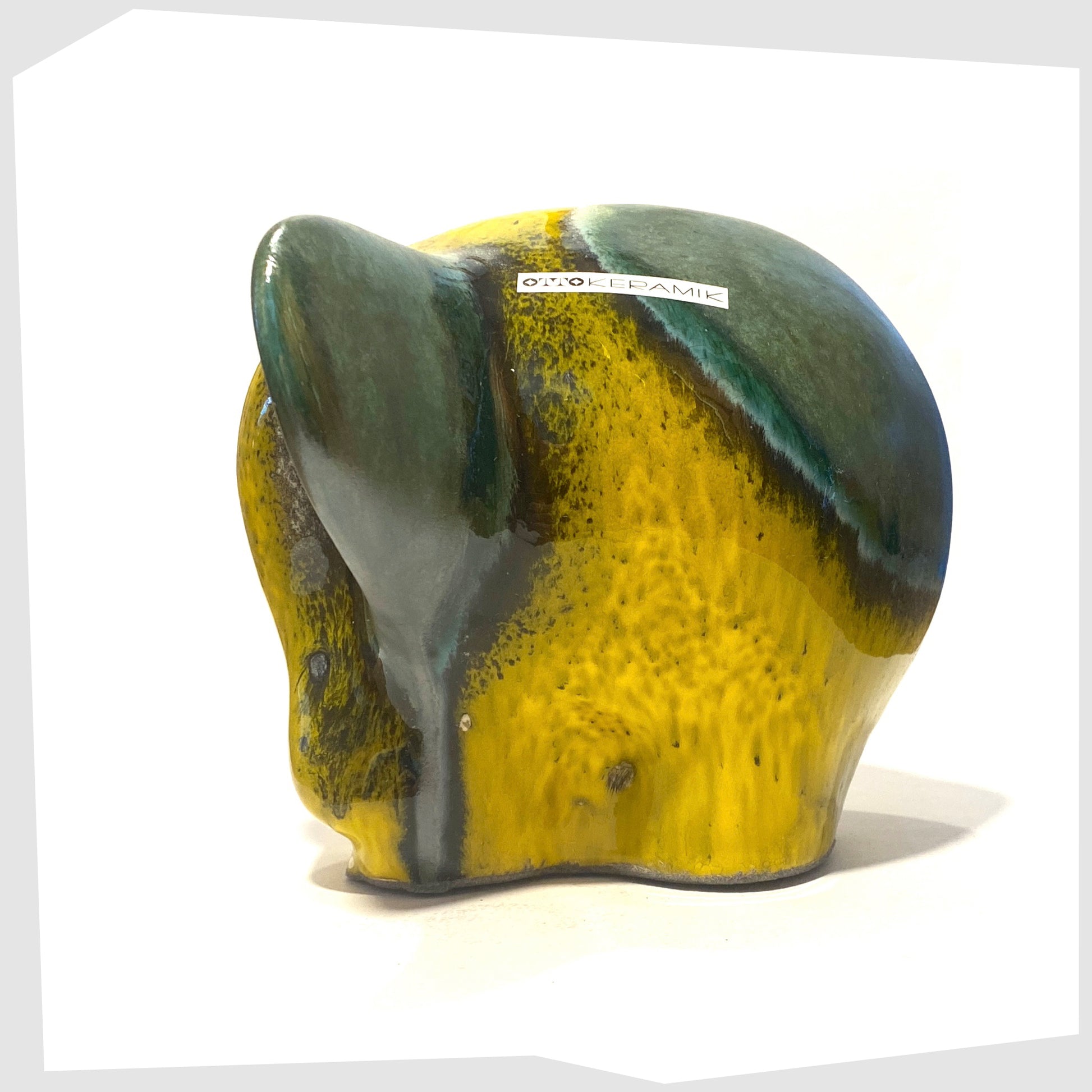 otto keramik ceramic elephant sculpture in Brazil glaze of vibrant yellow and sea green