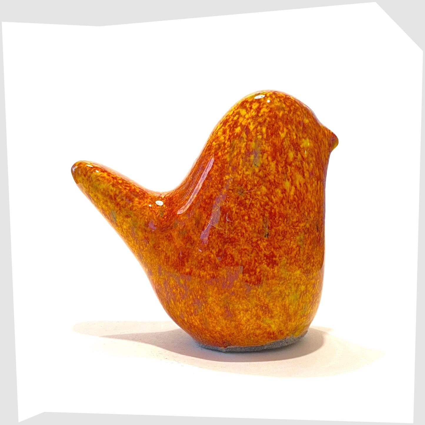 fired glazed ceramic bird sculpture by otto keramik germany, with orange, yellow and red speckled glazing