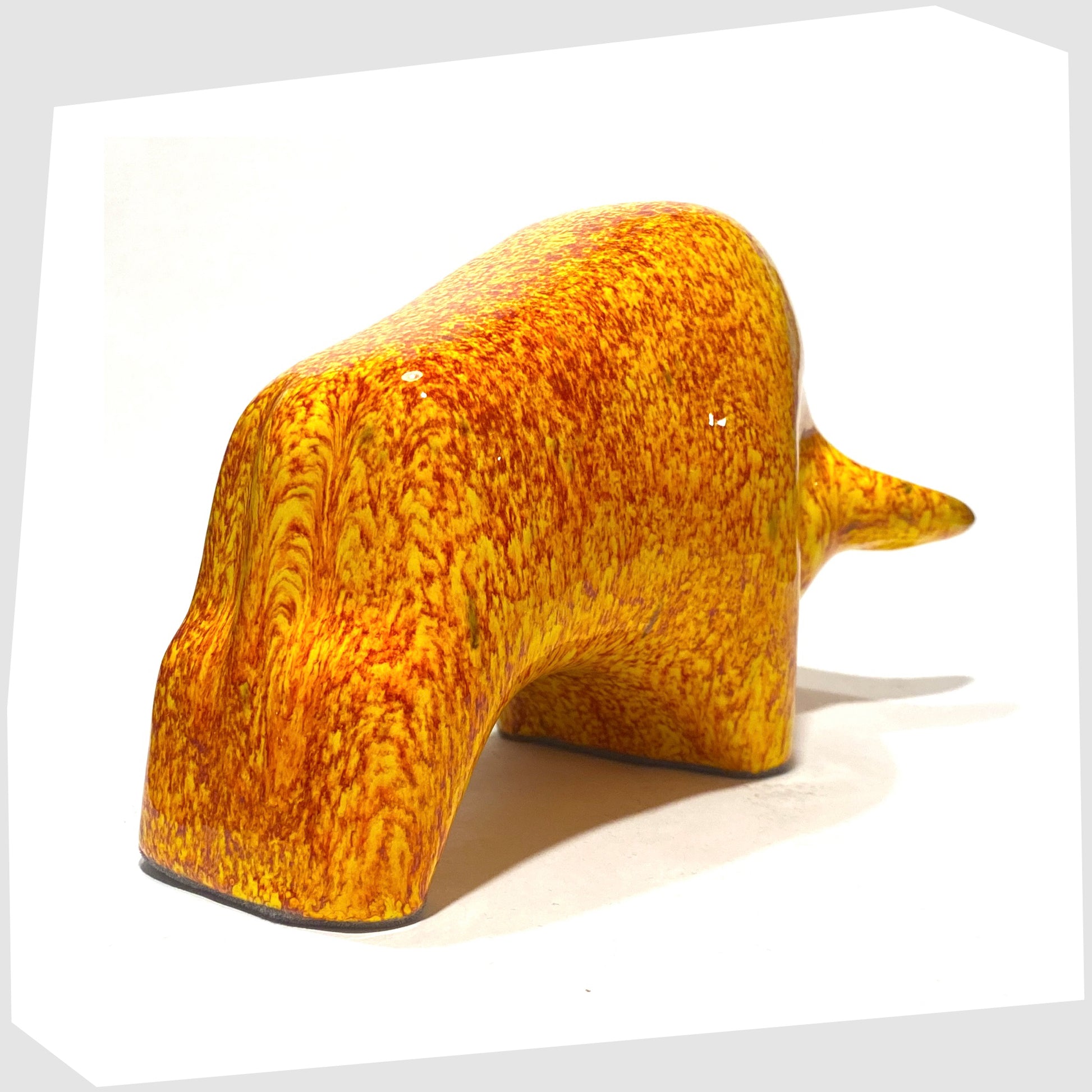 red, orange and yellow fire glazed otto keramik bull ornament