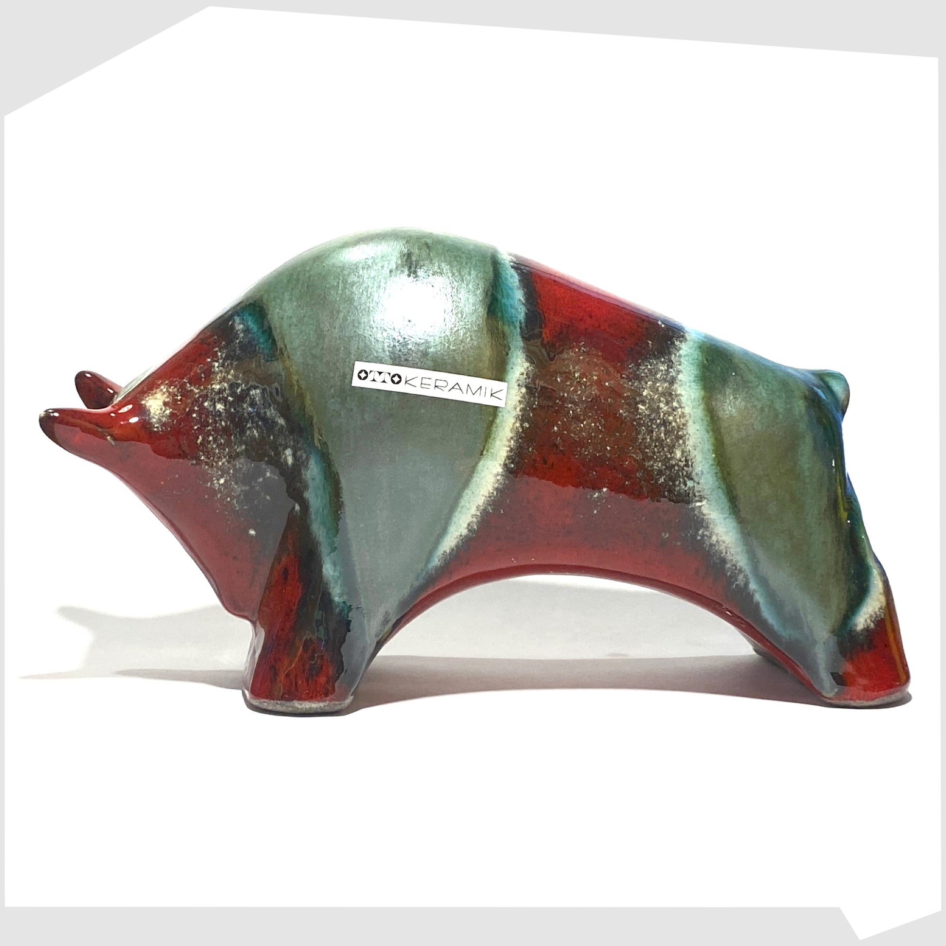 large otto keramik bull in read and sea green bolivia glaze