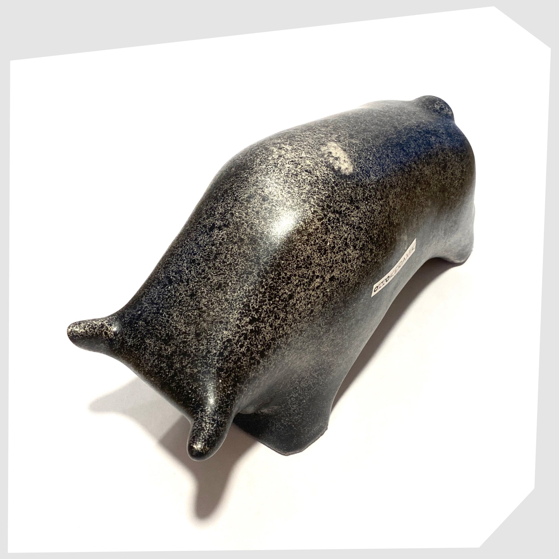 back of the large otto keramik bull sculpture in bold black speckled glaze