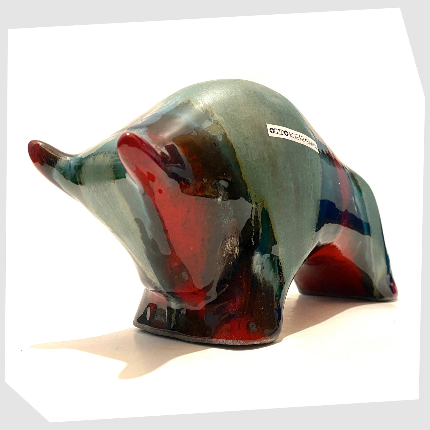 large ceramic bull-by-otto-keramiks-in-bolivia-red-and-green-drip-glaze