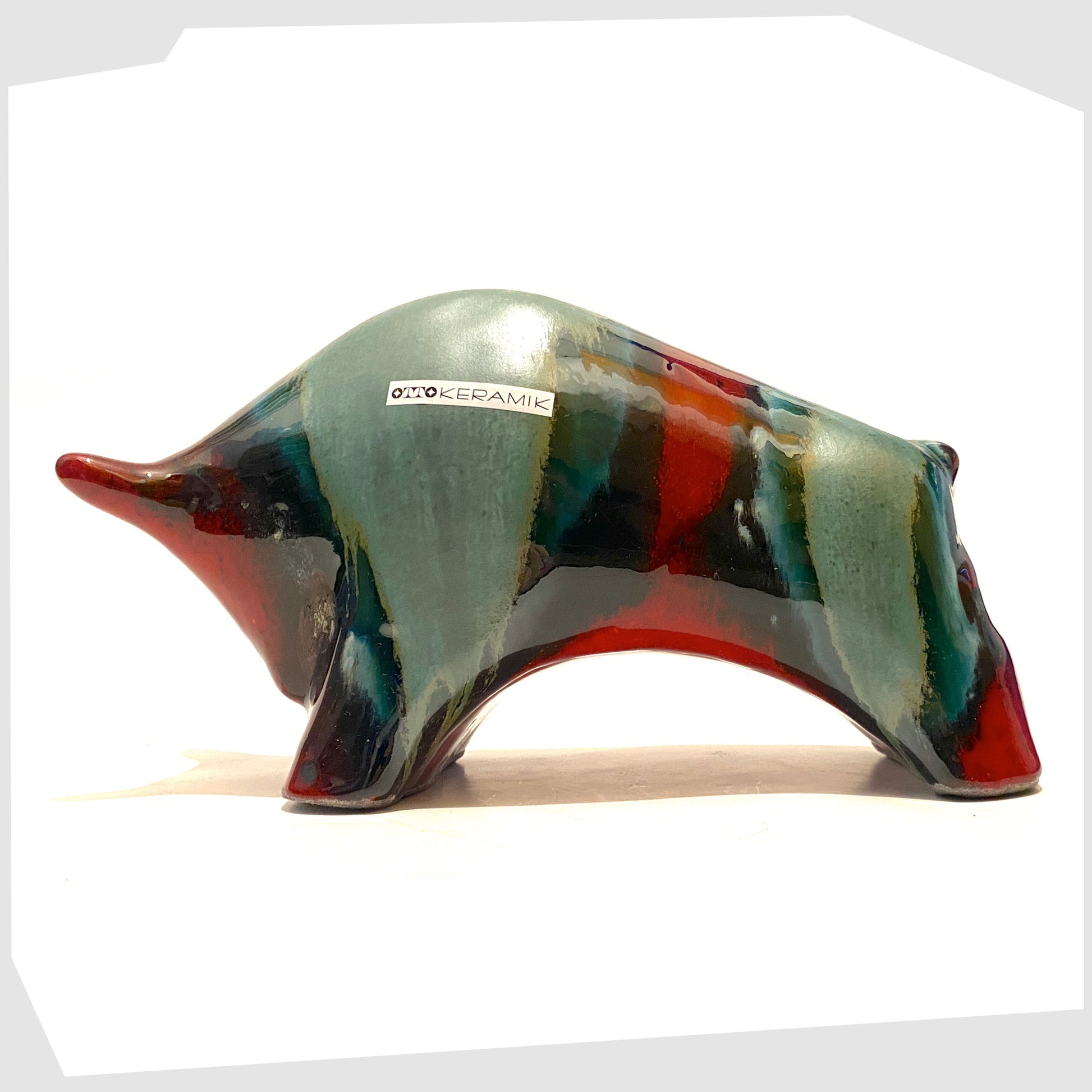 otto-keramik-large-bull-in-sea-green-and-red-bolivia-glaze