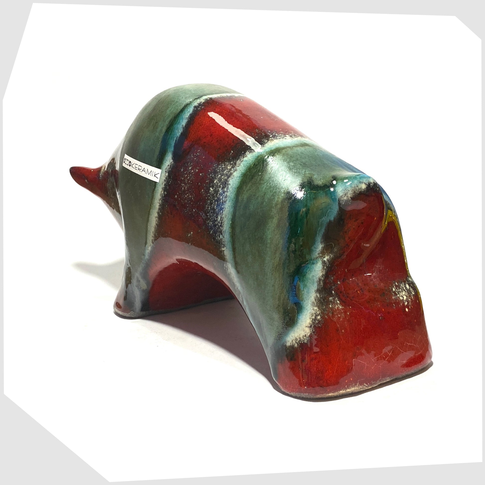 rear of the large otto keramik ceramic bull in red and green bolivia glaze