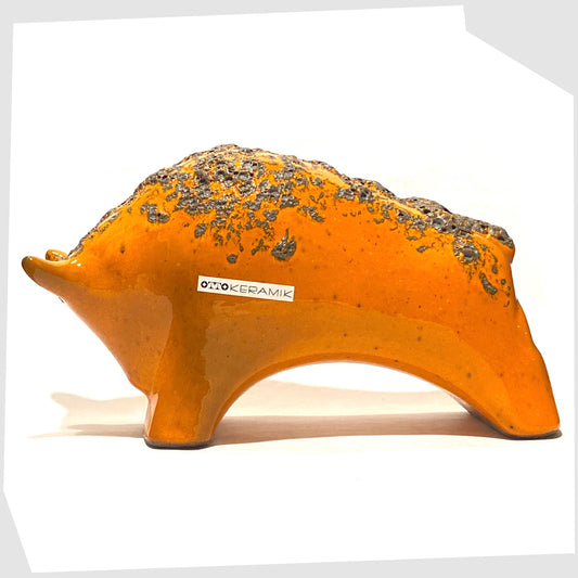 large otto keramik bull in vivid orange with fat lava stripe on the rear