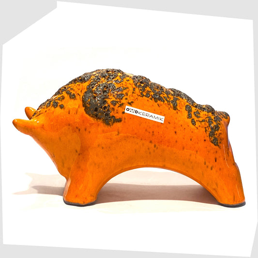 large otto keramik bull in vivid orange with fat lava stripe on the rear