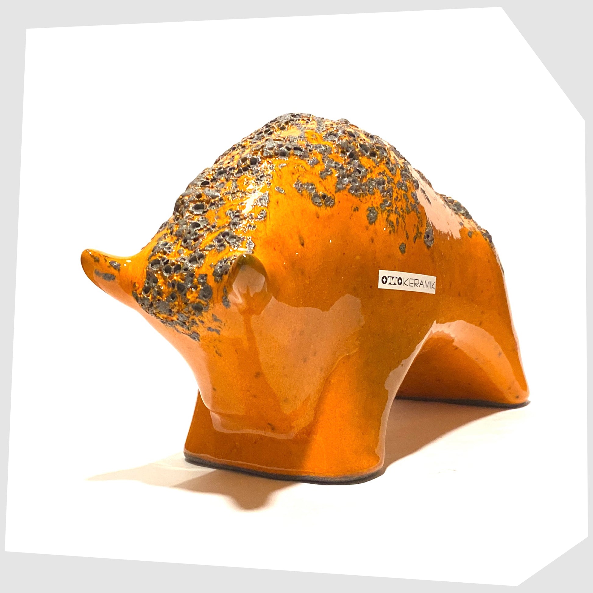 front horns on the large otto keramik bull in vivid orange with fat lava stripe on the rear
