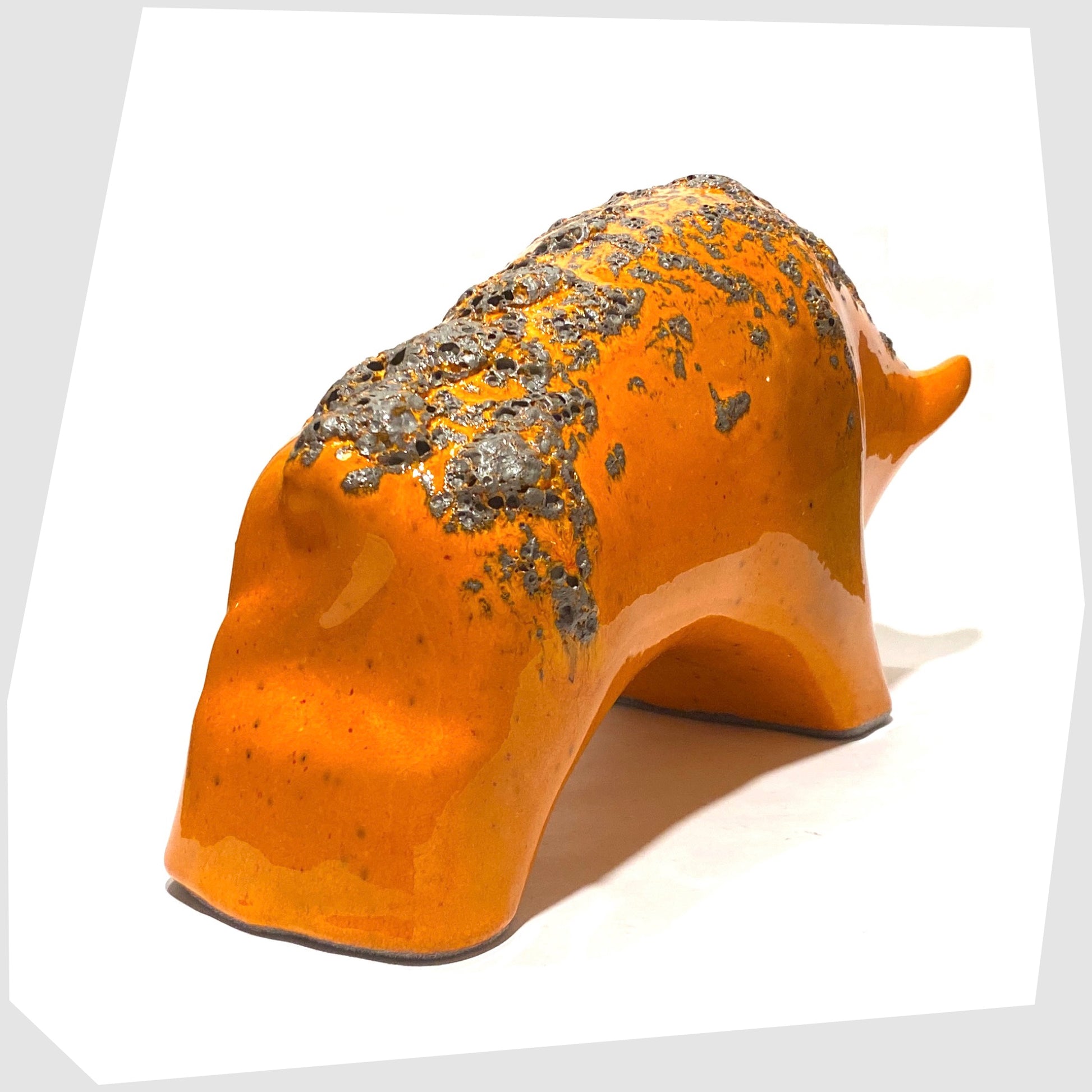 rear of the large otto keramik bull in vivid orange with fat lava stripe on the rear