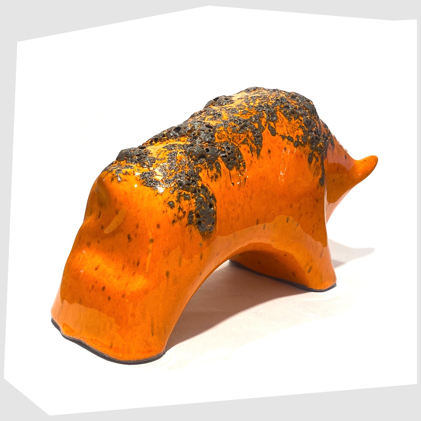 rear of the large otto keramik bull in vivid orange with fat lava stripe on the rear