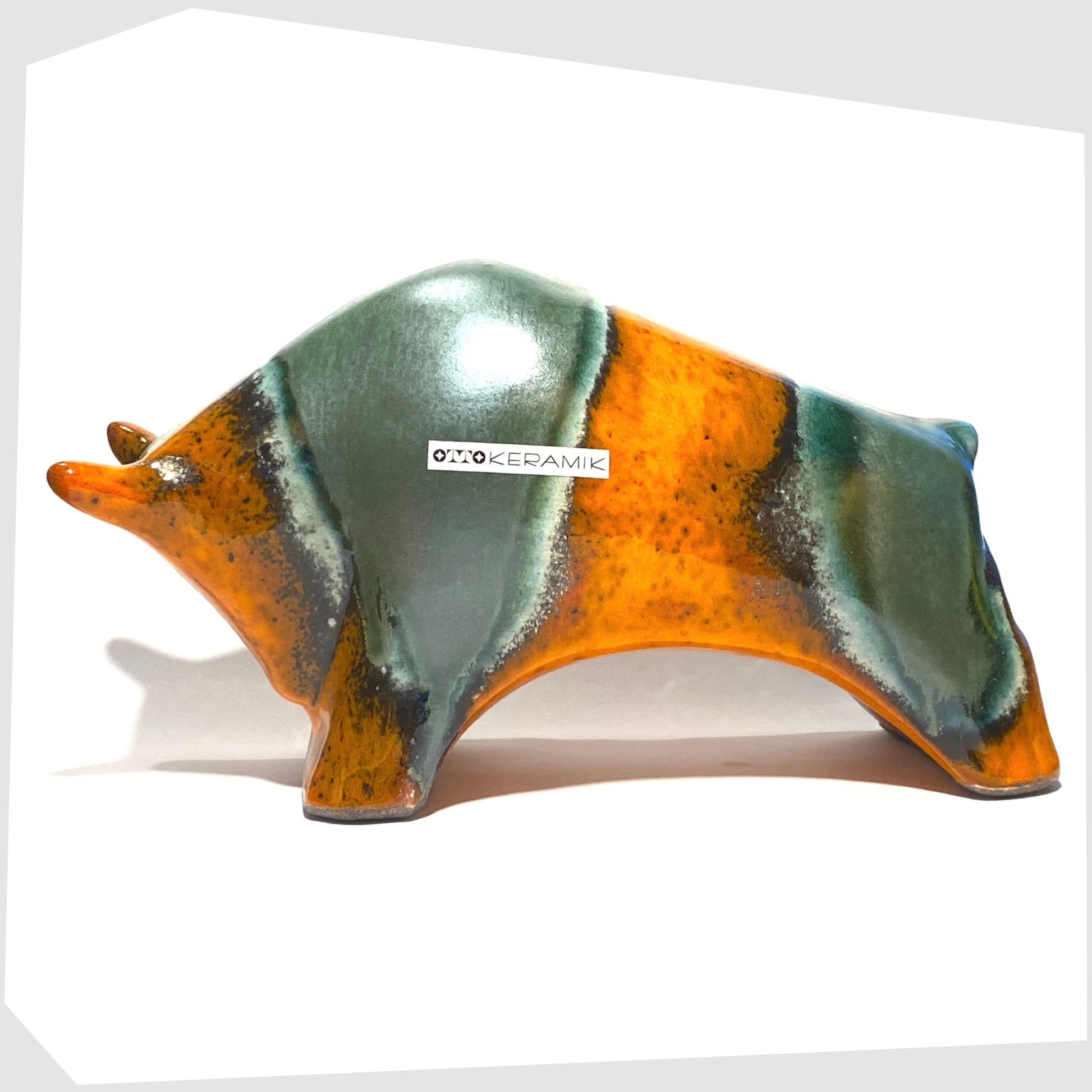 otto keramik large bull in peru glaze of orange with sea green drip glazing