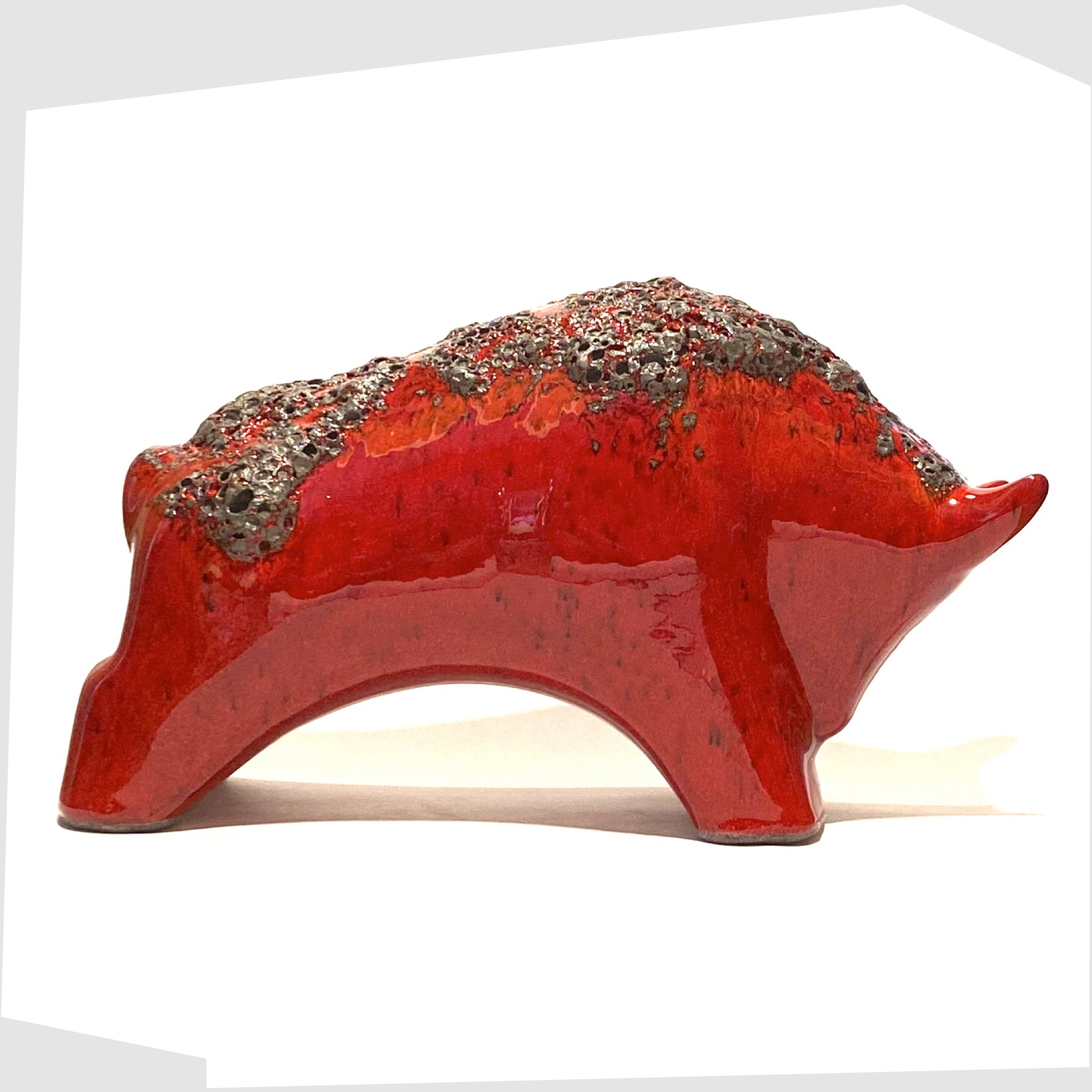 west german pottery-style otto keramik  bull in volcanic red fat lava glaze