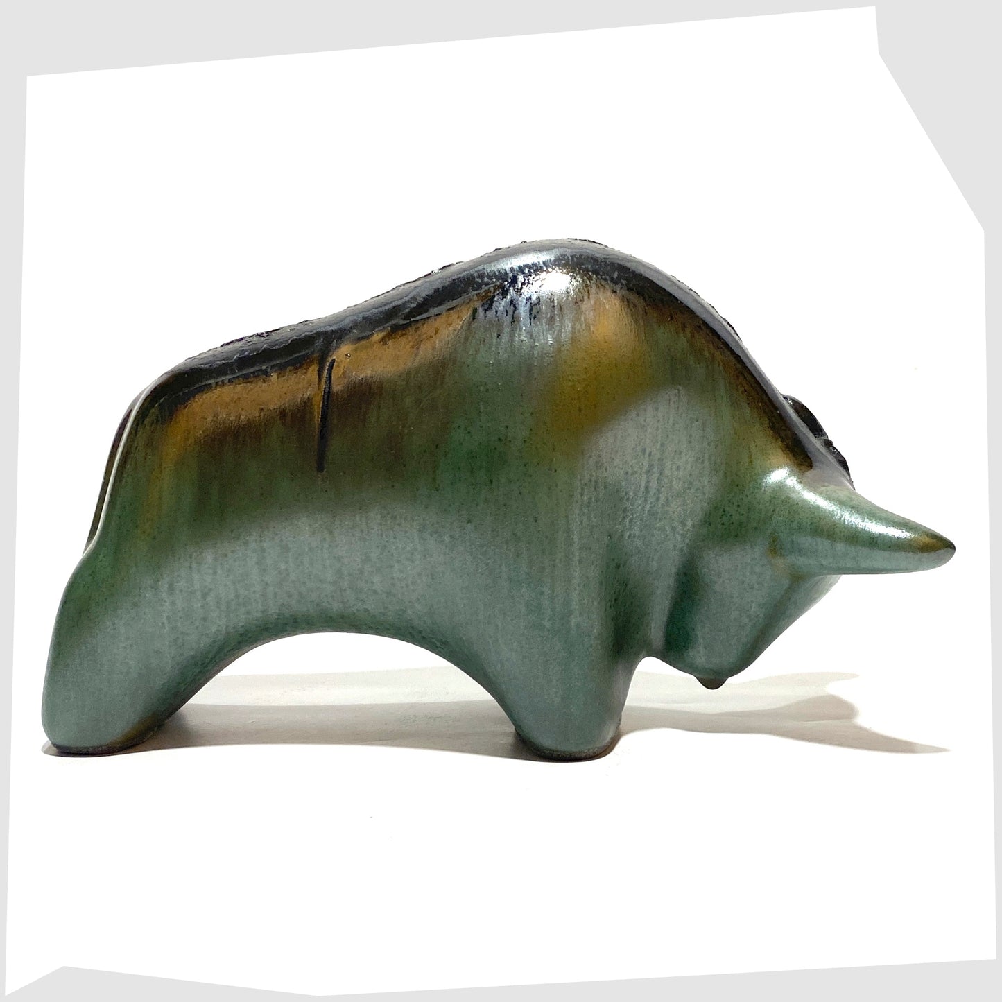 otto keramik ceramic bull sculpture glazed in sea green with black fat lava along the spine