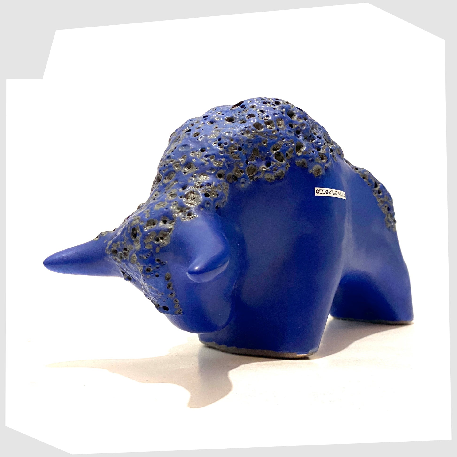 ceramic-bull-ornament-in-matte-blue-with-blue-fat-lava-by-otto-keramik-germany