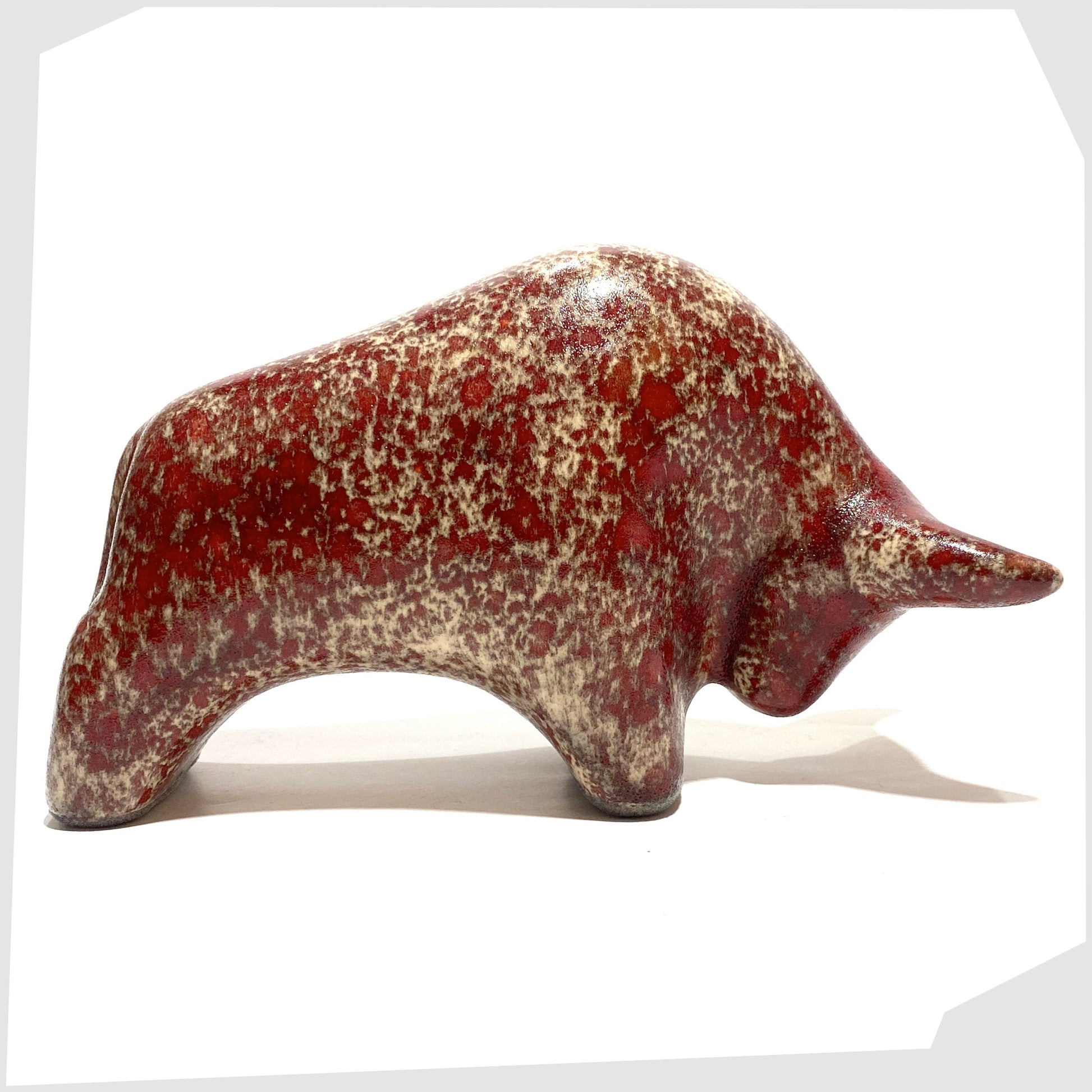 otto keramik cearmic bull figurine in textured molten glaze of red and beige speckles 