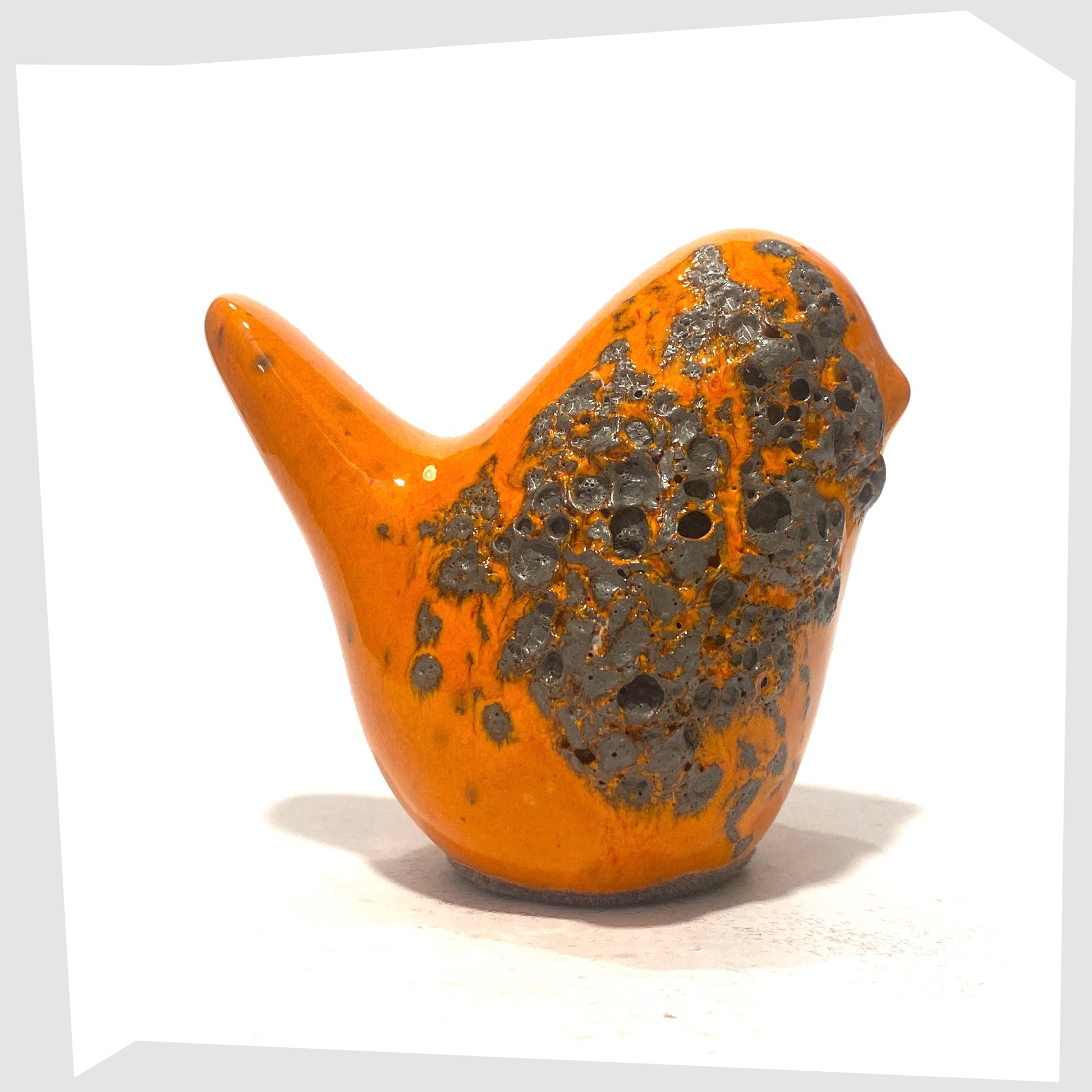 otto keramik bird figurine in orange with fat lava glaze