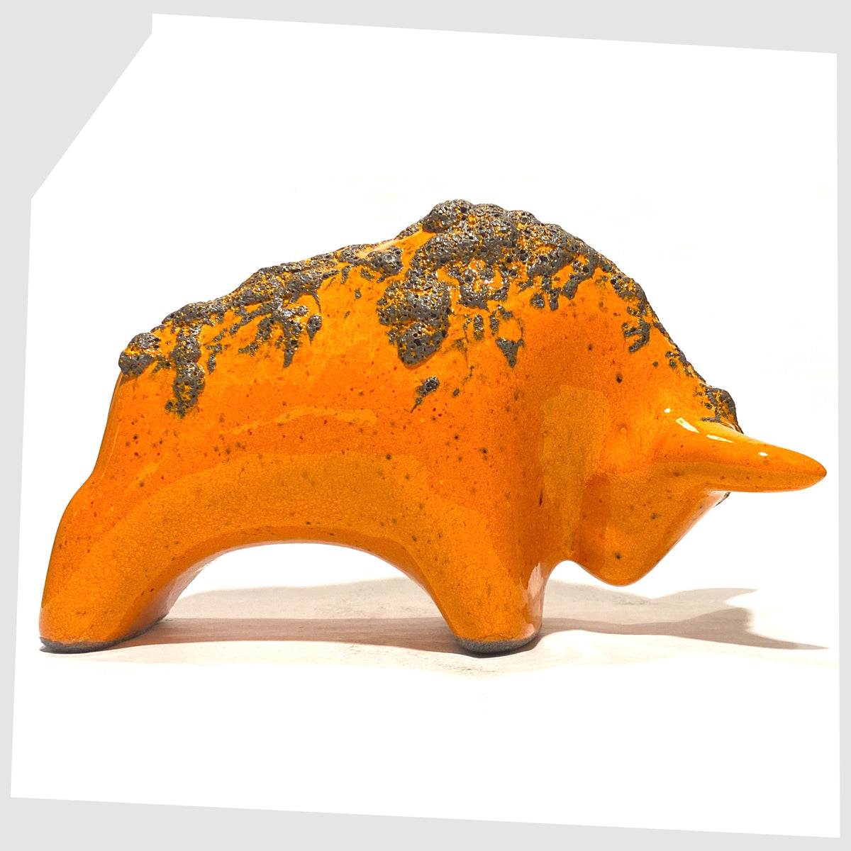 Otto Keramik Bull-shaped figurine in Orange Fat Lava Glaze, shown on a white background