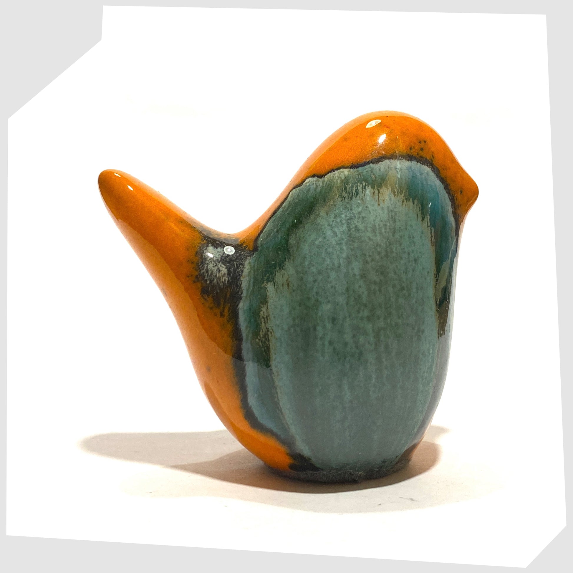 ceramic bird in peru glaze of orange and sea green by otto keramik, germany