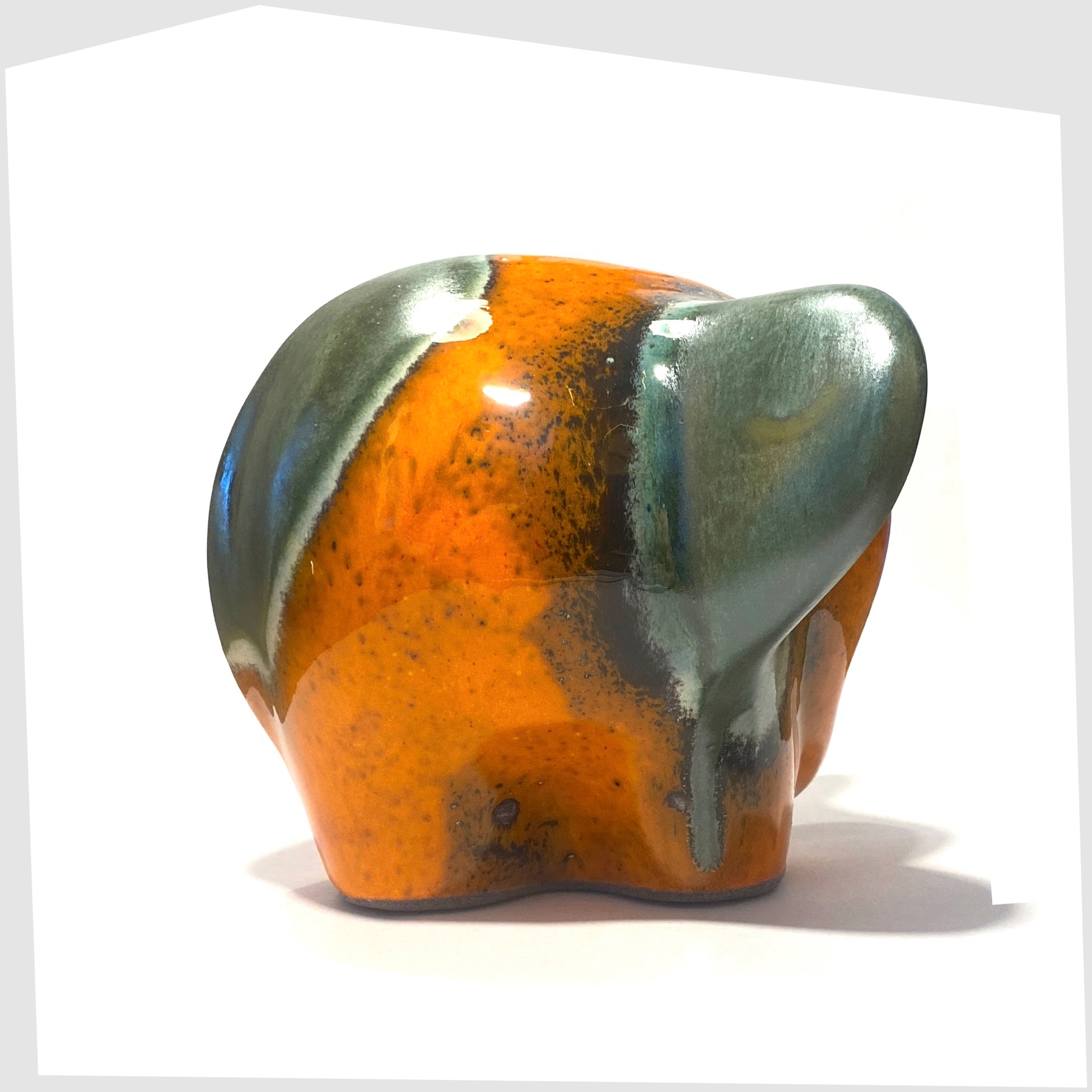 otto keramik ceramic elephant sculpture in peru glaze of orange and sea green