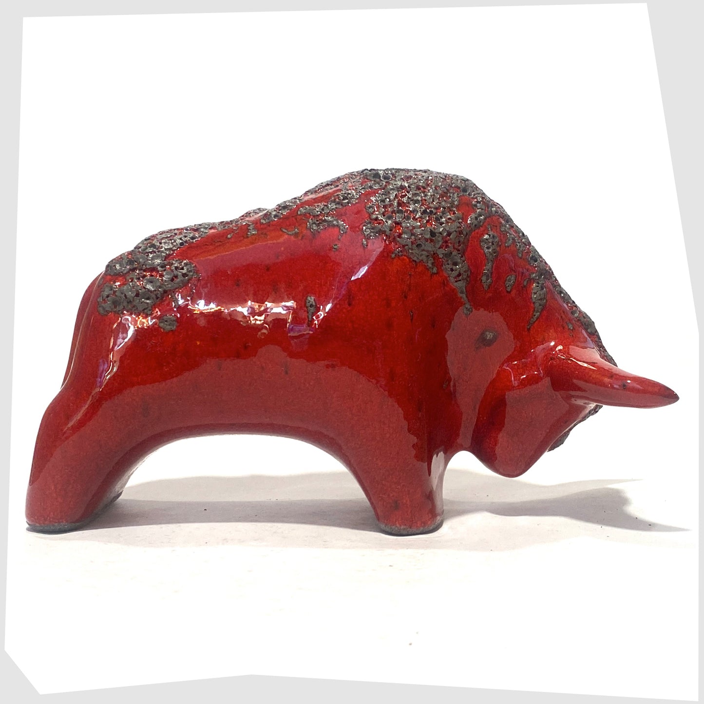 otto keramik bull sculpture, made of ceramic, in red glaze with grey fat lava along the spine