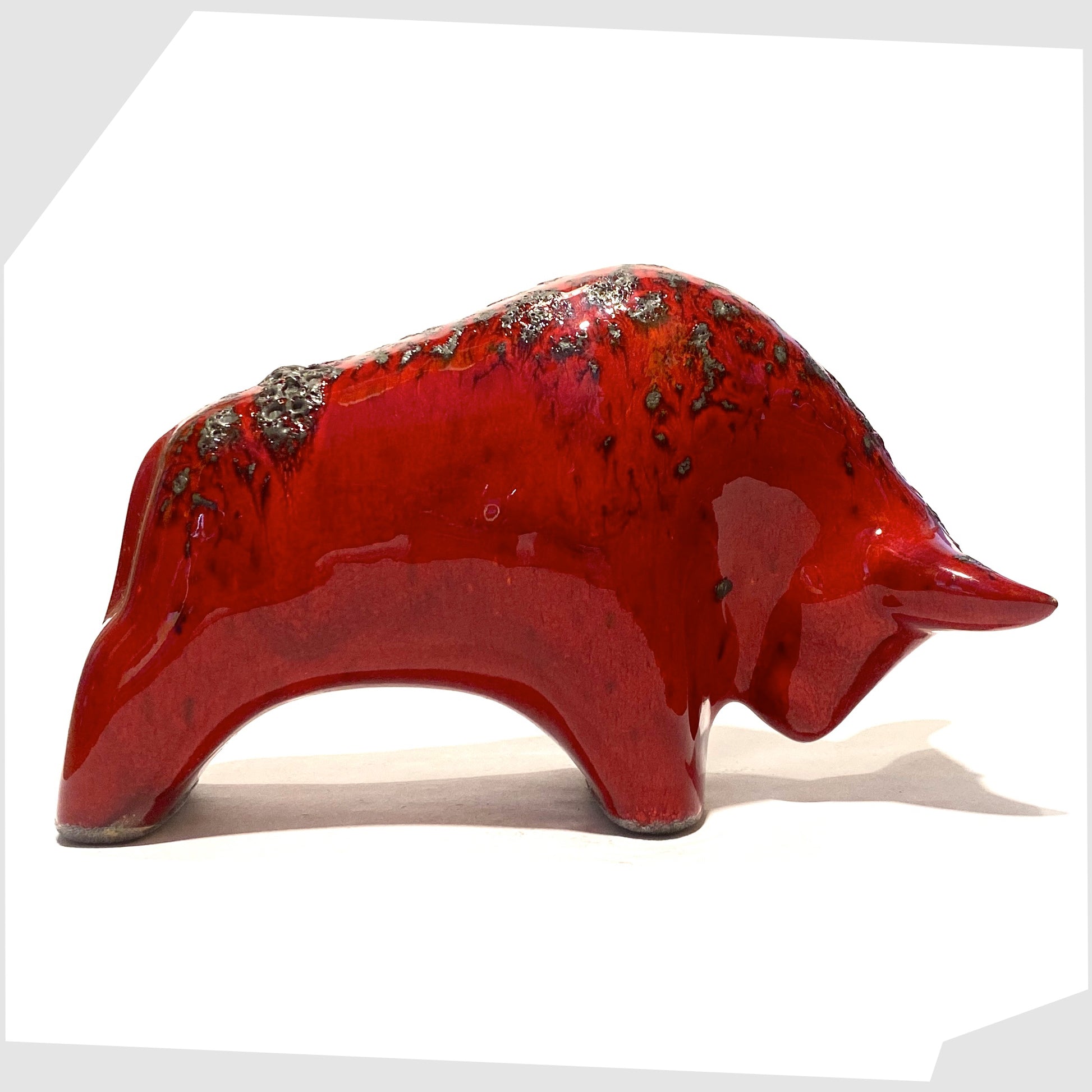 otto keramik bull sculpture, made of ceramic, in red glaze with grey fat lava along the spine