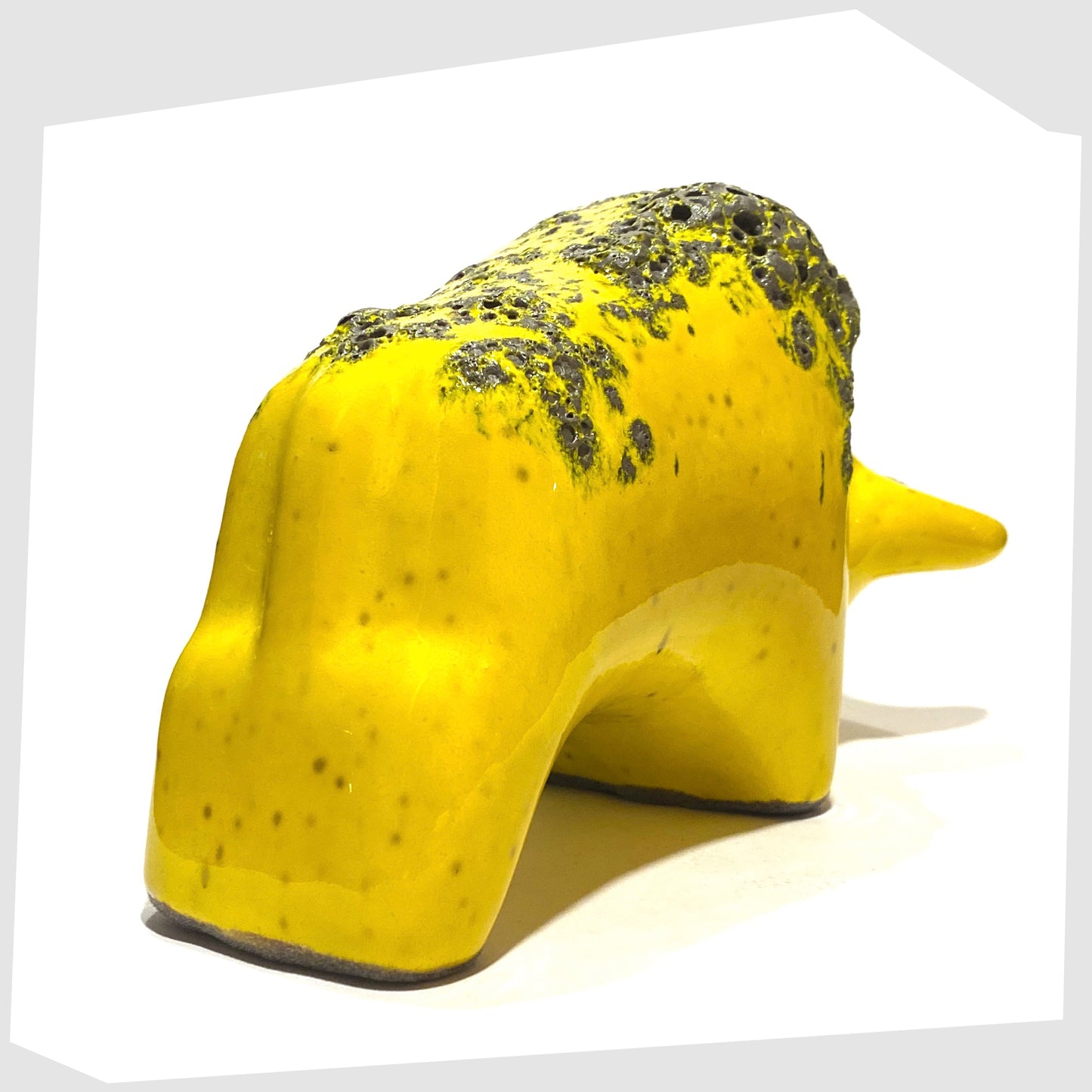 fat lava glazing on the gloss yellow glazed ceramic bull ornament by otto keramik, germany
