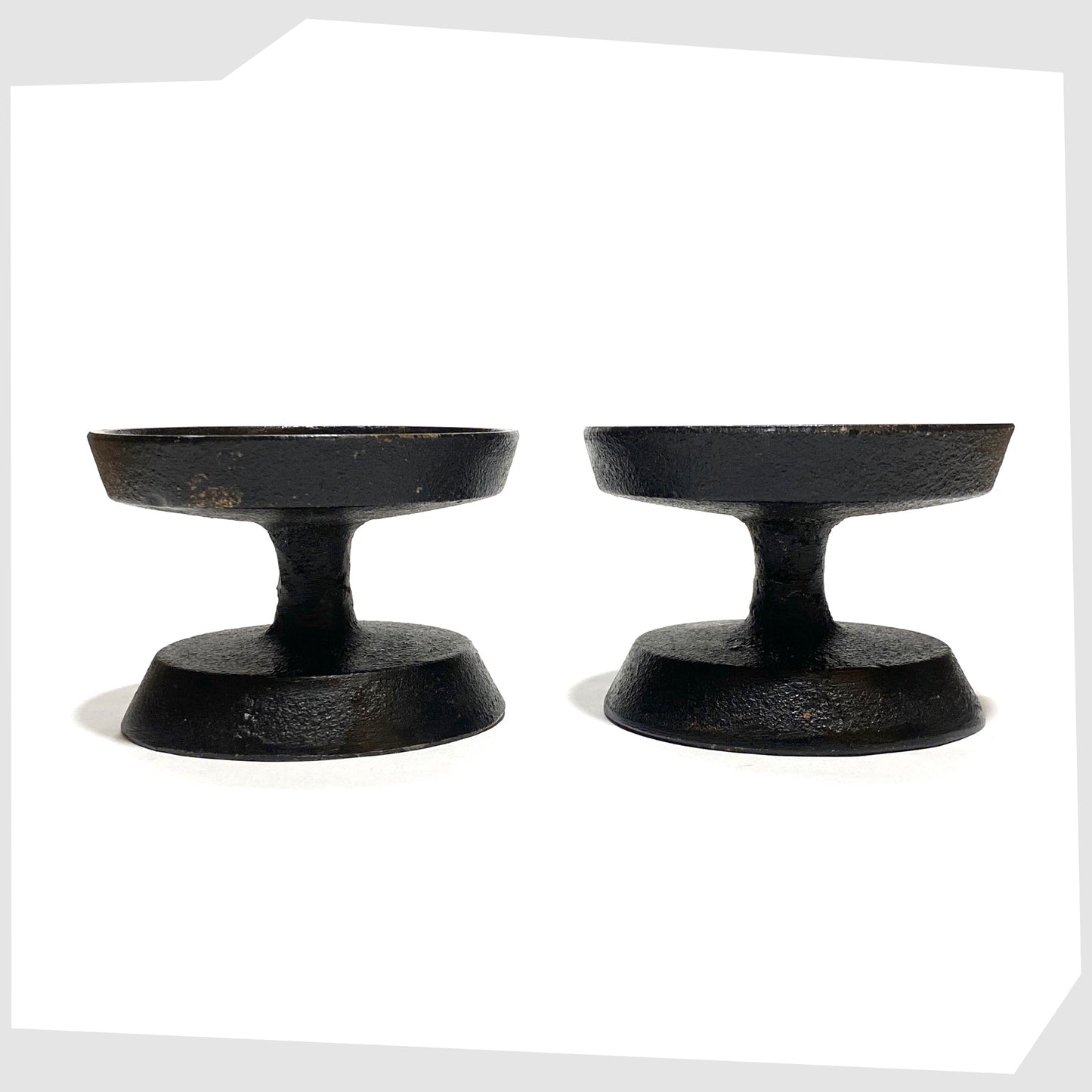 side profile of the robert welsh inspired candleholder made of black cast iron