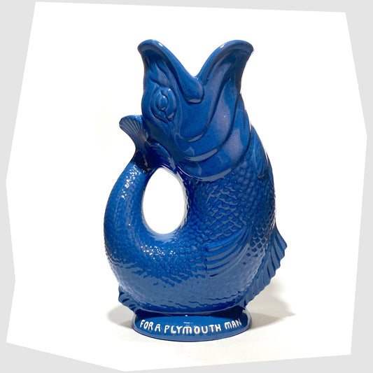 Original Dartmouth Pottery Gluggle Jug in blue glaze with "for a Plymouth man' on the base rim