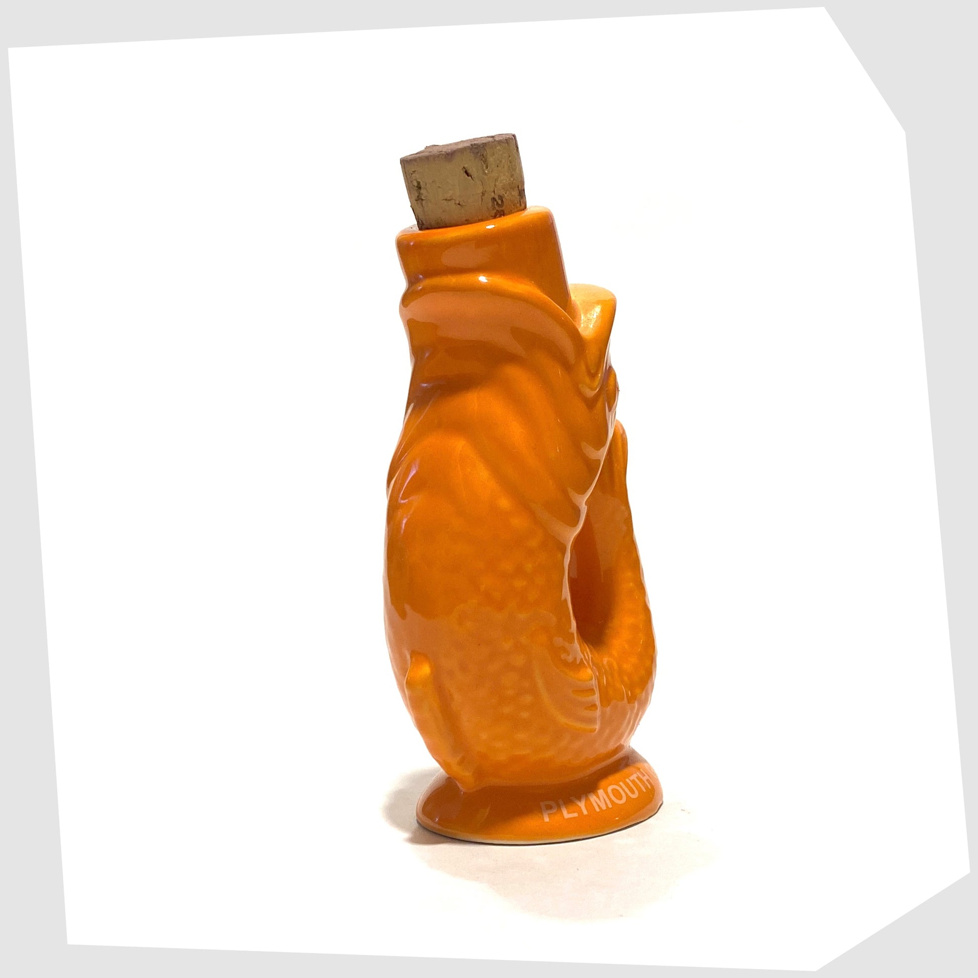 plymouth gin mini gluggle jug in vibrant orange glaze with cork stopper