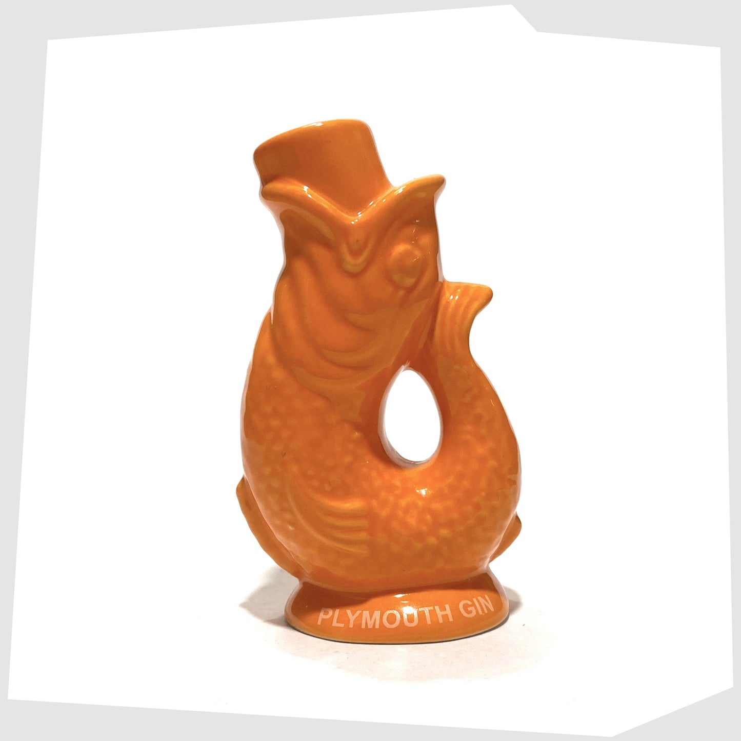 mini gluggle jug in orange glaze with white plymouth gin text around the base rim