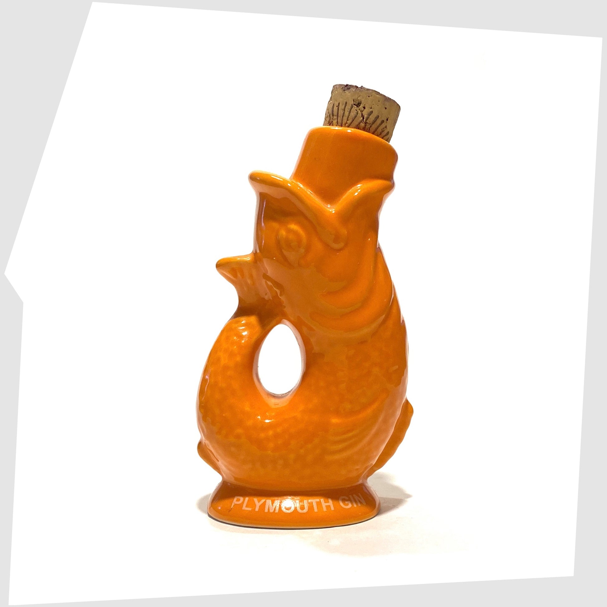 vintage plymouth gin mini gluggle jug in vibrant orange glaze with cork stopper