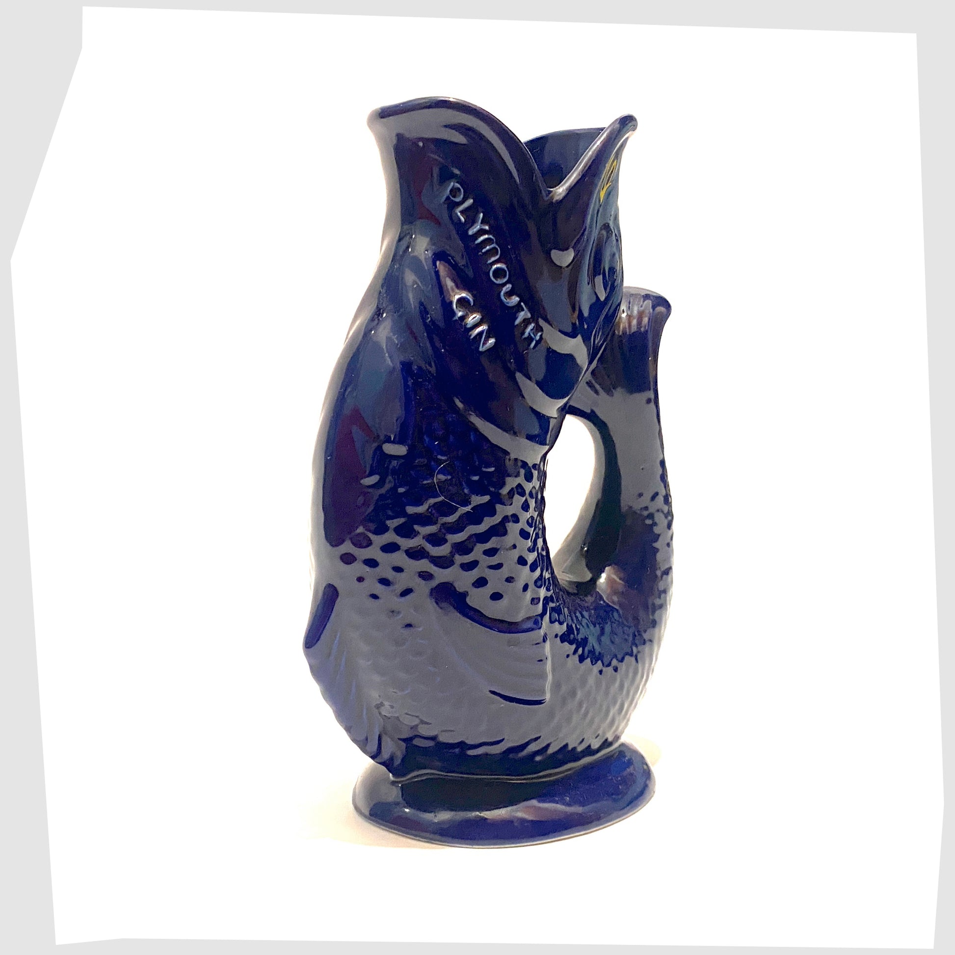 plymouth-gin-gluggle-jug-in-dark-cobalt-blue-with-plymouth-gin-embossed-text