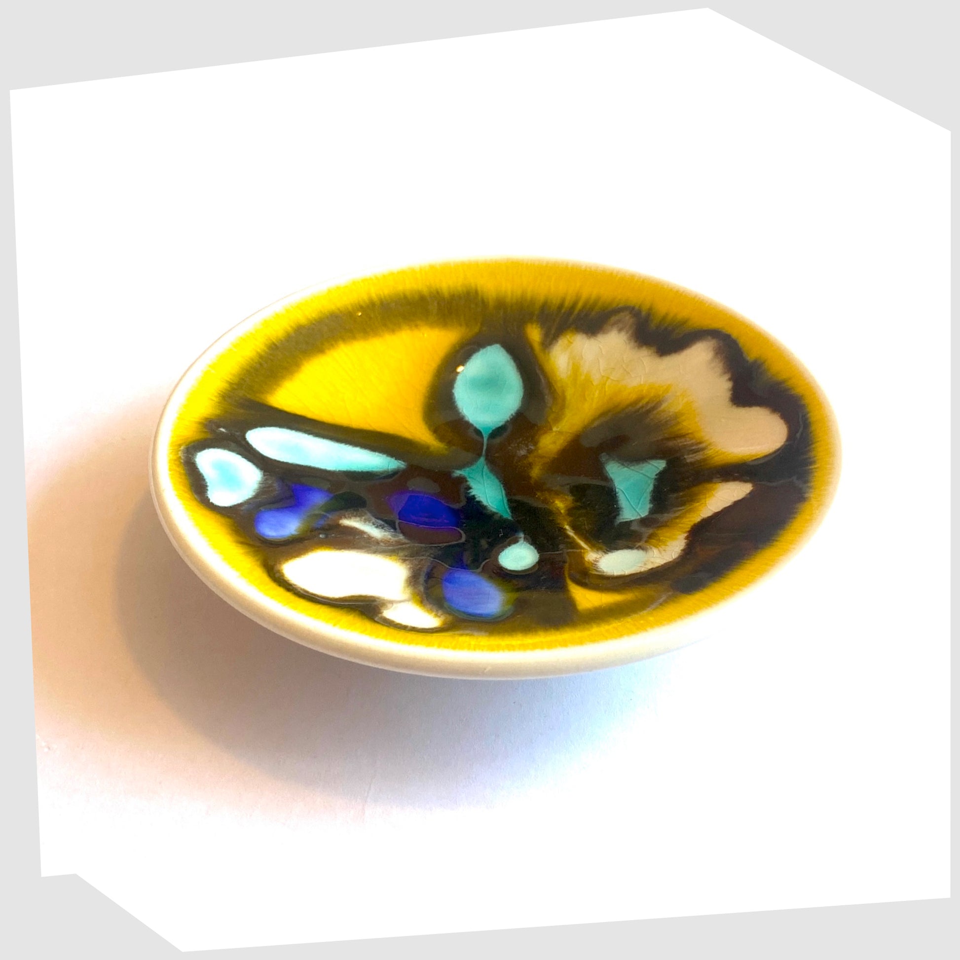 Vintage Poole Pottery Delphis Pin Dish, Shape 49, in a yellow glaze with fluid forms of turquoise and blue, created by Carol Cutler