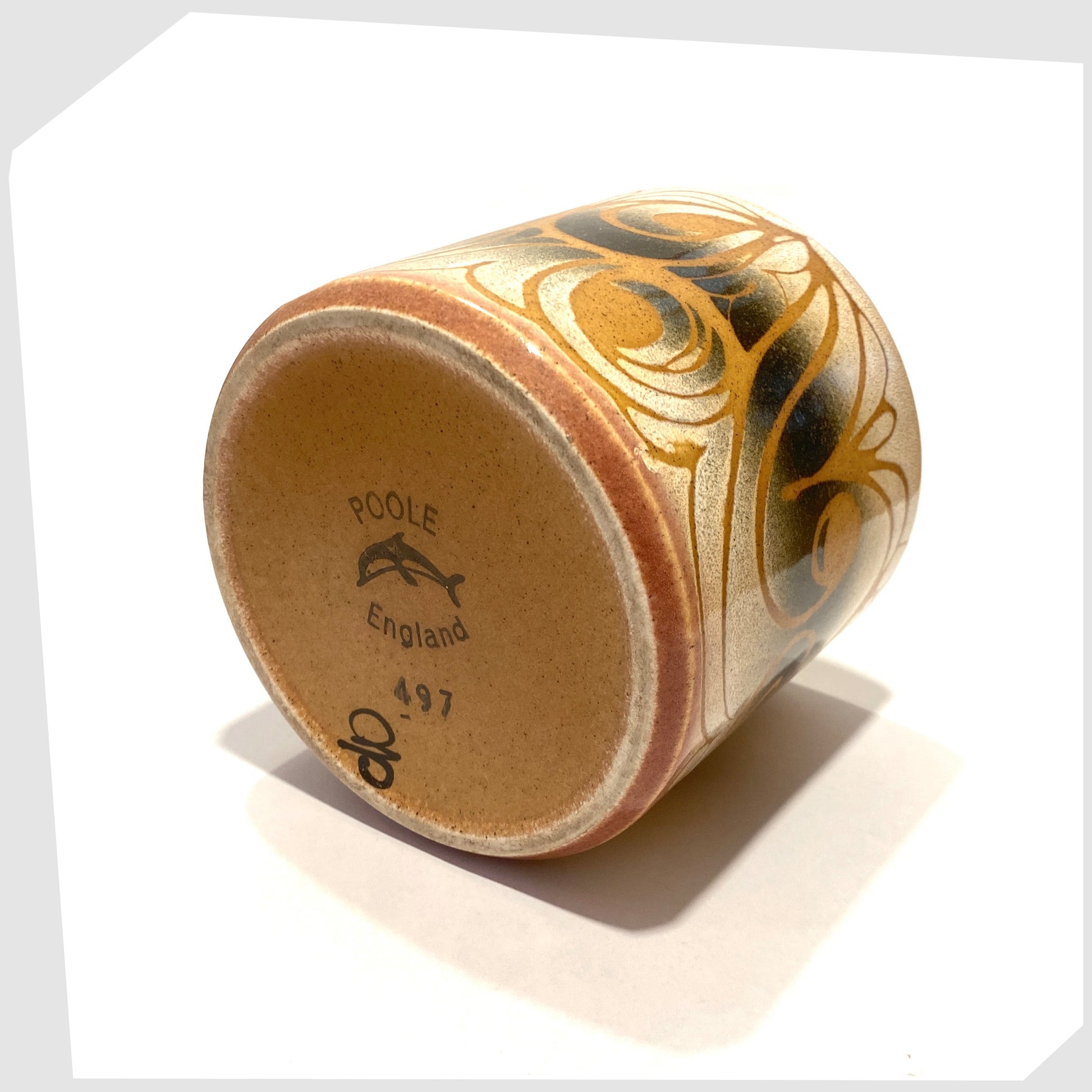 base of the poole pottery aegean planter, shape 497, cylindrical ceramic plant pot glazed in swirling orange lines on grey and white glaze