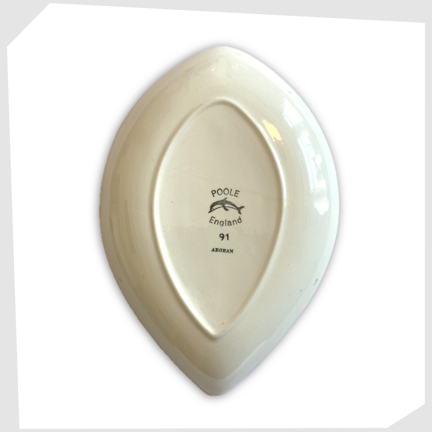 rear of the poole pottery teardrop dish, shape 91, with the poole logo and shape number