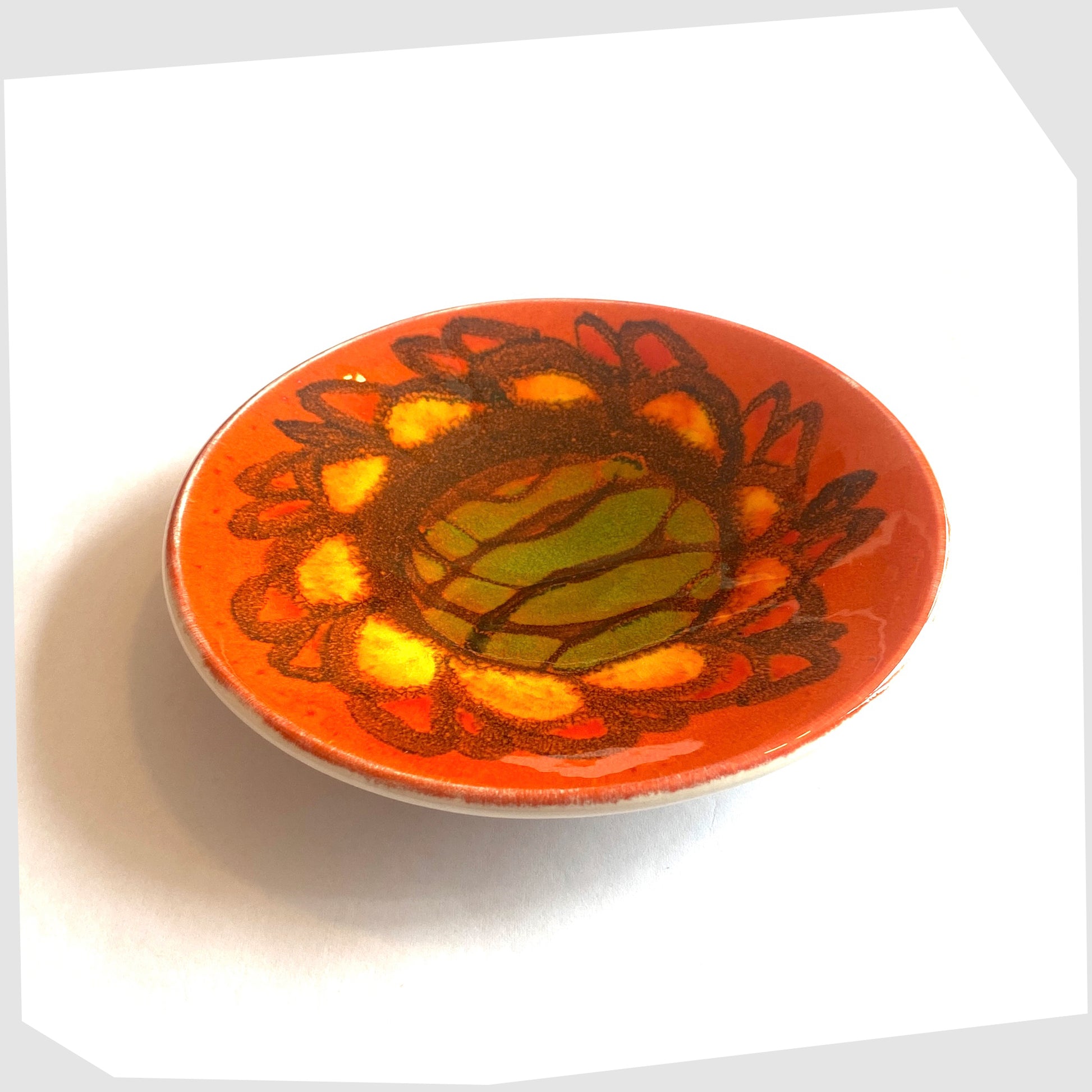 1960s Poole Pottery Pin Dish, shape 49 by Sylvia Penny, finished in a vivid Delphis glaze of vibrant orange, green and yellow
