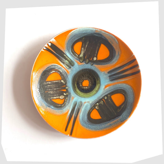 Poole Pottery Delphis Dish, Shape 3, by Carolyn Bartlett in a vivd orange glaze with radiating pattern of blue and warm grey