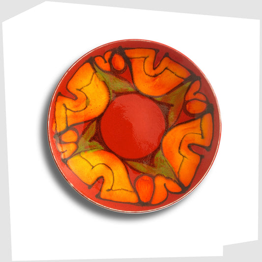 decorative plate by Poole Pottery in the Delphis glaze of red with orange and green forms