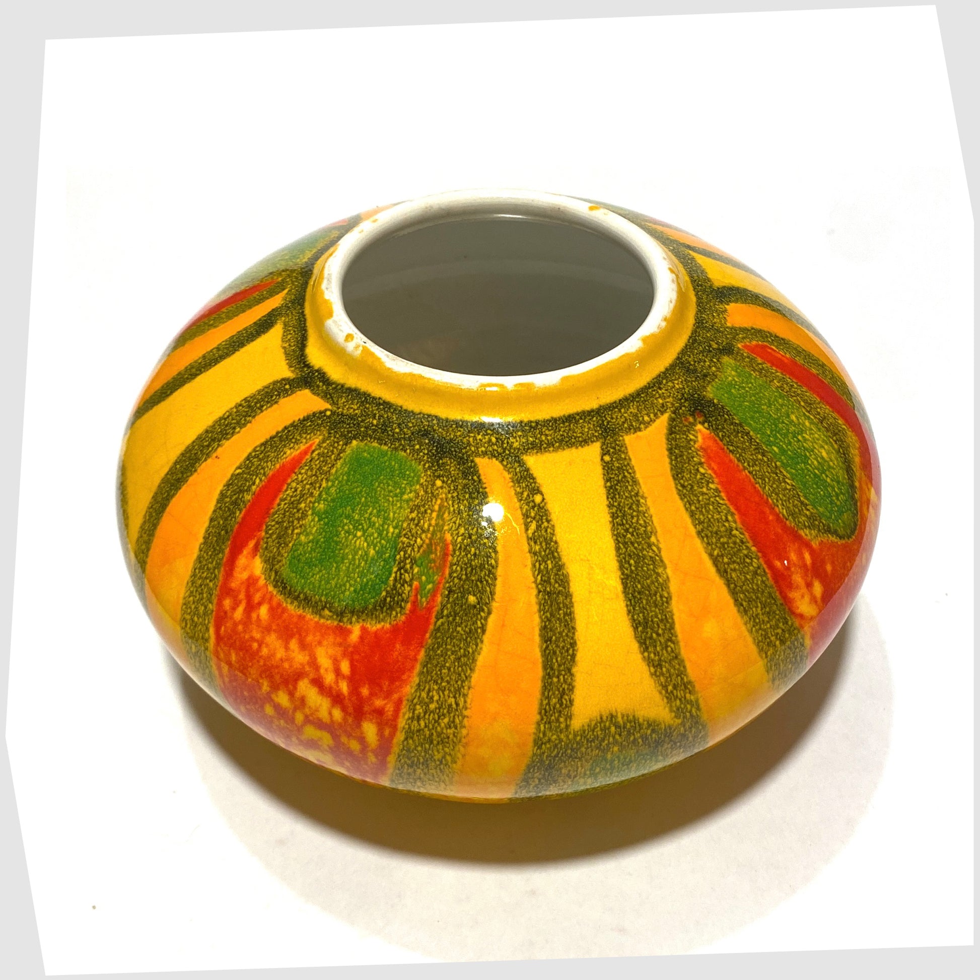 top of the Poole Pottery Onion Vase, Shape 32, by Gillian Taylor in a vivid yellow glaze with abstract forms of orange, red and green