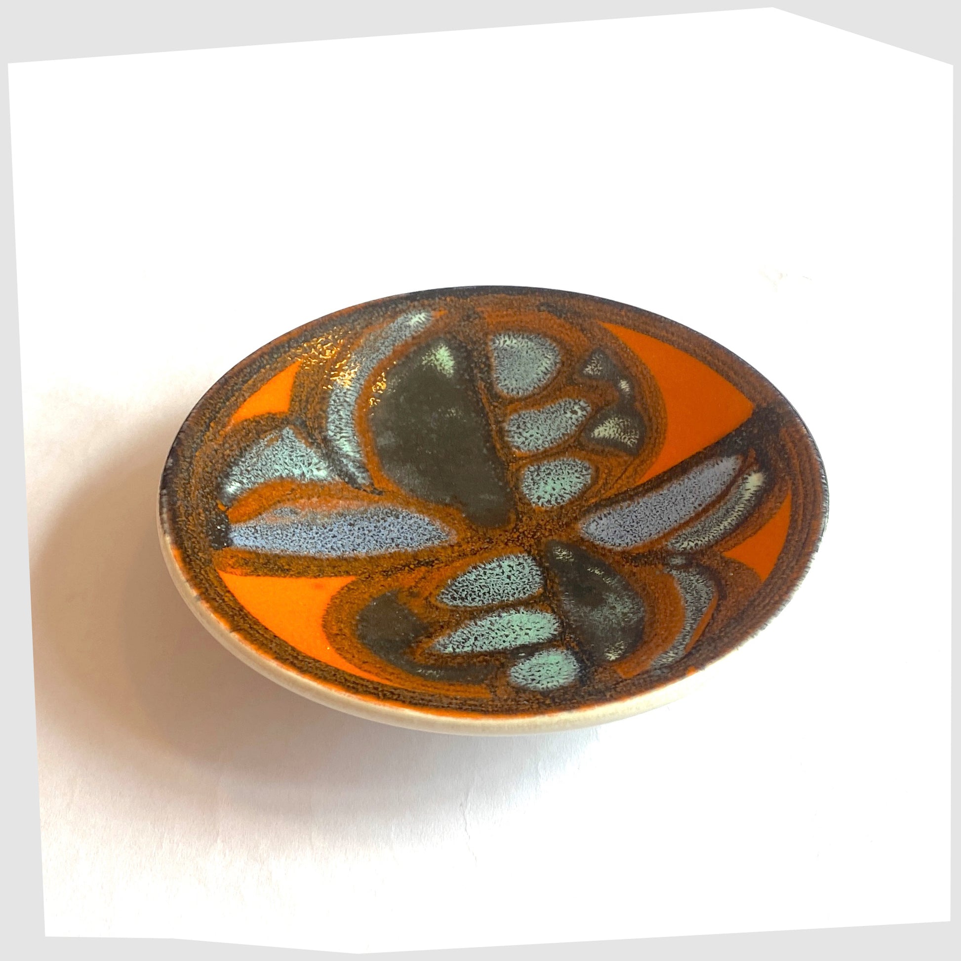vintage Poole Pottery Delphis Pin Dish, Shape 49, finished in a rich orange glaze with blue and turquoise forms