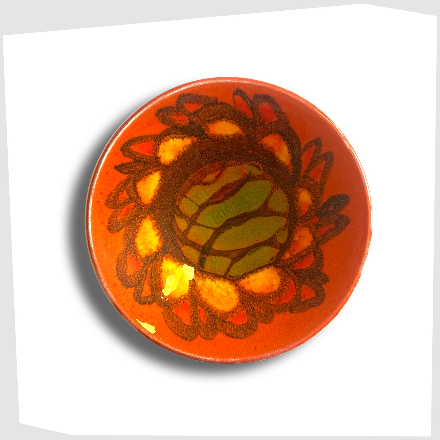 Poole Pottery Pin Dish, shape 49 by Sylvia Penny, finished in a vivid Delphis glaze of vibrant orange, green and yellow