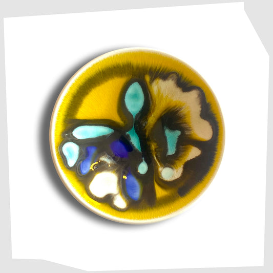 Poole Pottery Delphis Pin Dish, Shape 49, in a yellow glaze with fluid forms of turquoise and blue, created by Carol Cutler
