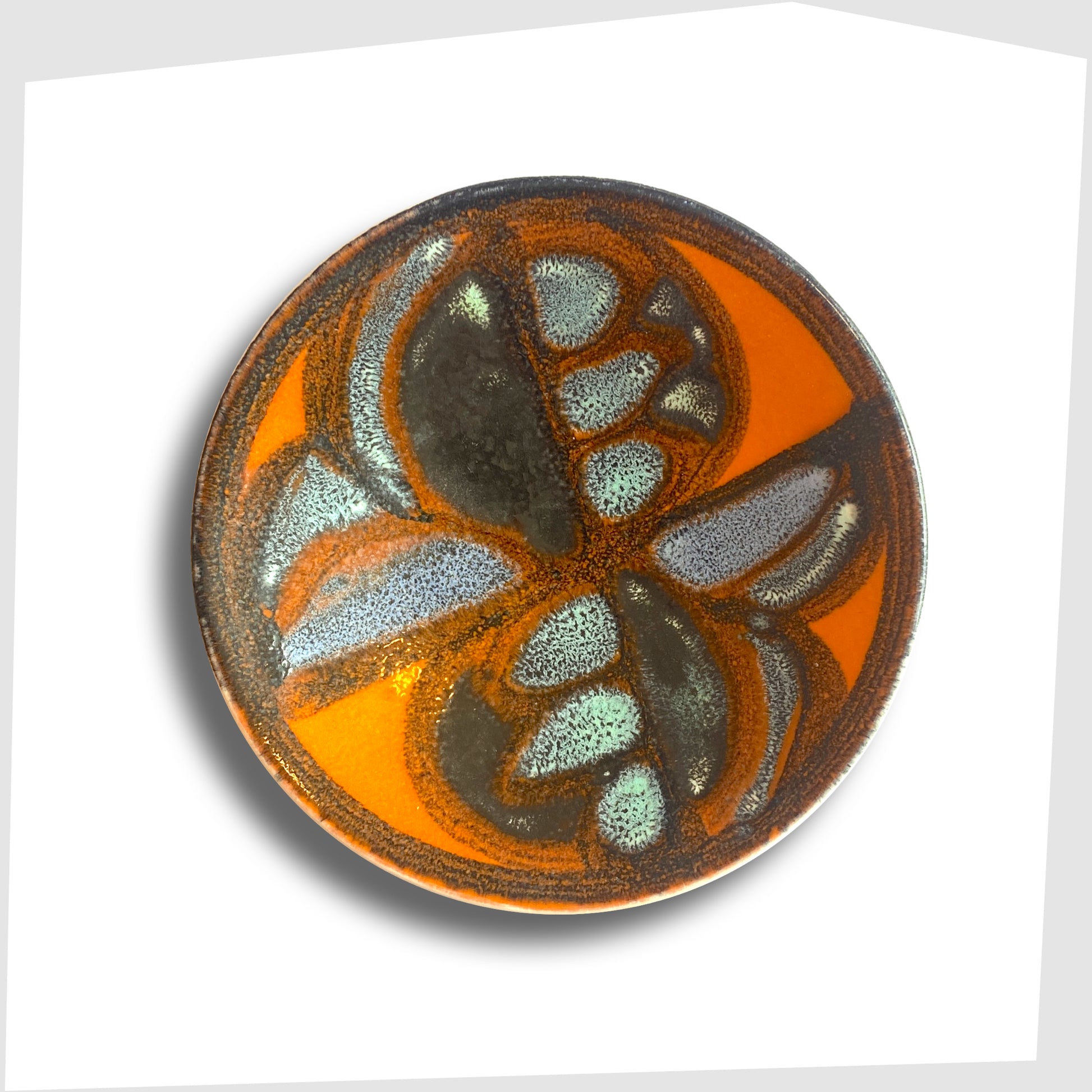 Poole Pottery Delphis Pin Dish, Shape 49, finished in a rich orange glaze with blue and turquoise forms