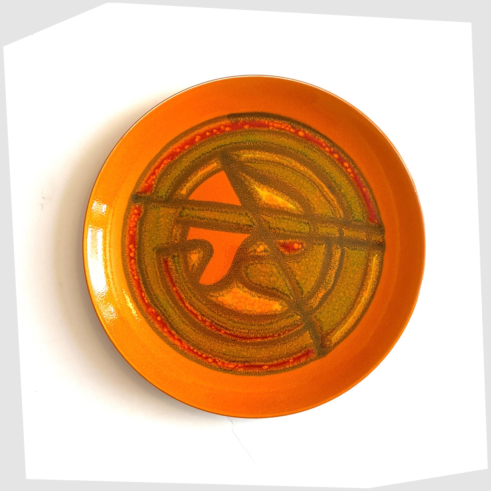Poole Pottery Delphis Plate by Wendy Smith in a vibrant orange glaze with fluid forms of yellow and green